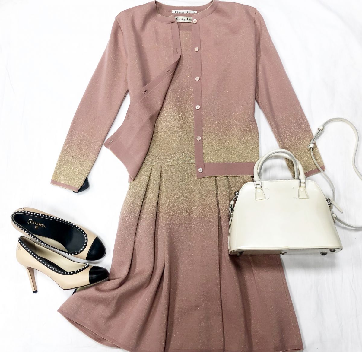Костюм Christian Dior размер 38/42 цена 39 138 руб 
Сумочка MARGIELA