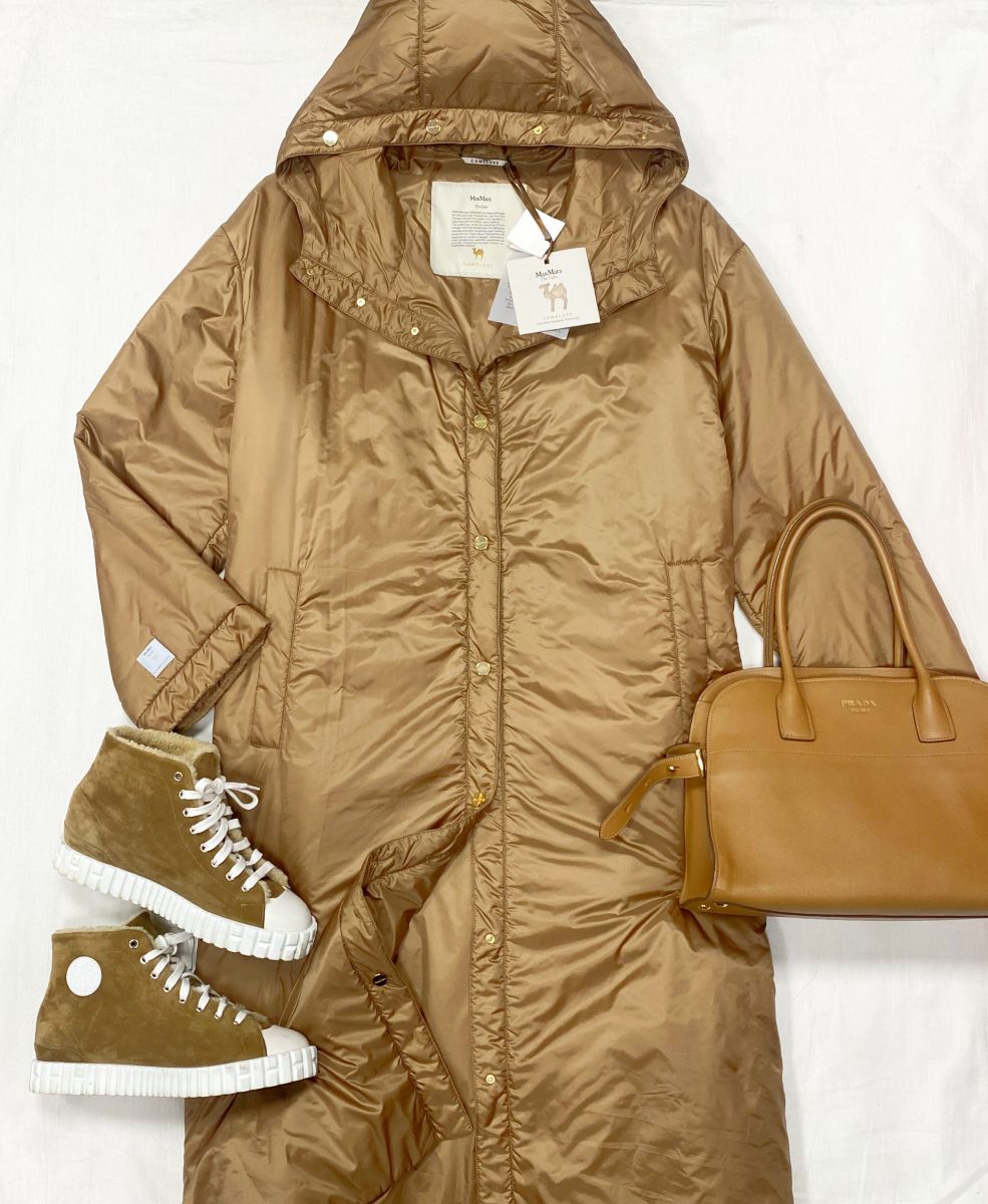 Пальто / пух / Max Mara размер 50 цена 46 965 руб 
Кеды / на меху / Hermès размер 38 цена 93 930 руб
Сумка Prada