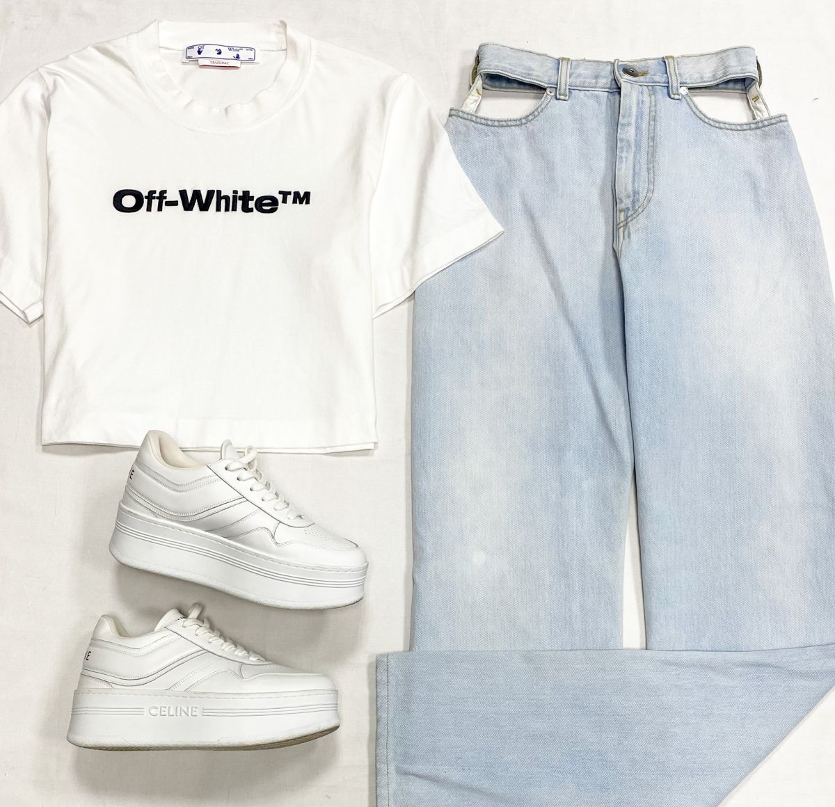 Джинсы Maison Martin Margiela размер 42 цена 15 655 рубФутболка Off White размер 42 цена 10 959 рубКроссовки Celine размер 38 цена 46 965 руб