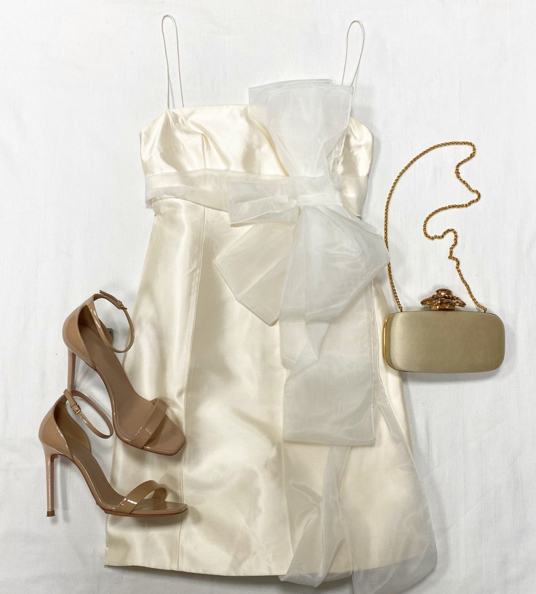 Платье Dolce Gabbana размер 42 цена 15 655 руб Босоножки Saint Laurent размер 39 цена 23 483 руб Клатч Oscar De La Renta