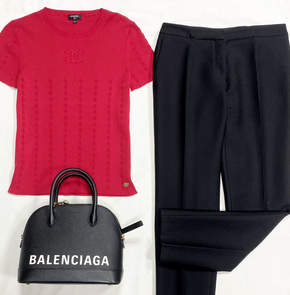 Кофта Chanel размер 38 цена 46 965 руб
Брюки Christian Dior размер 40 цена 15 655 руб
Сумка Balenciaga 