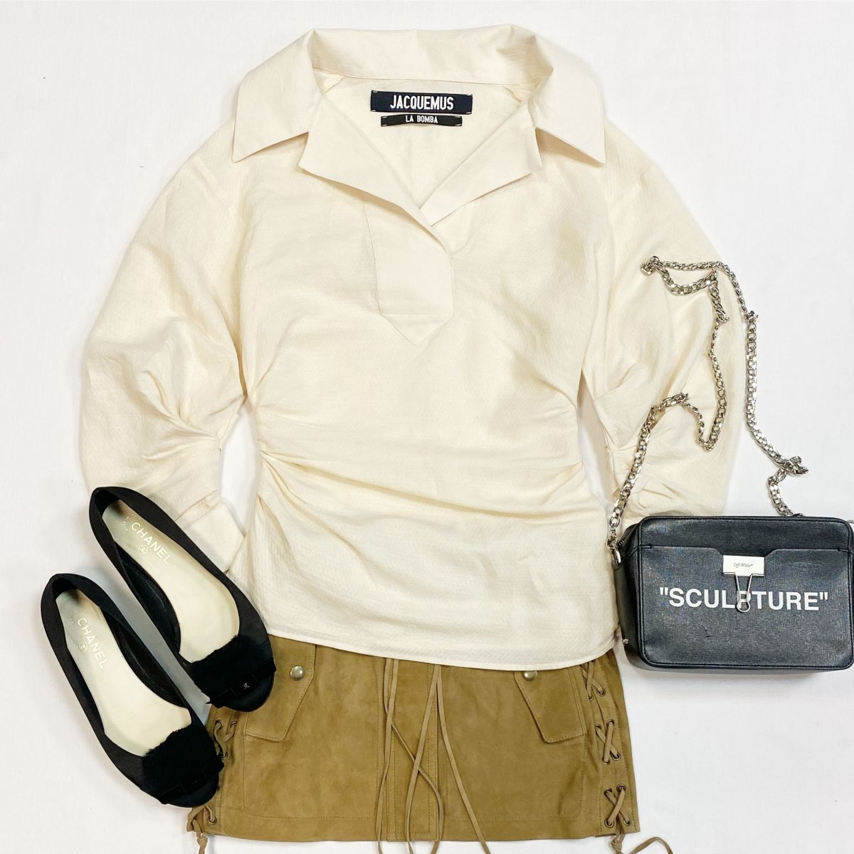 Блузка Jacquemus размер 36 цена 7 693 рубЮбка/замша/ Saint Laurent размер 36 цена 15 385 рубБалетки Chanel размер 40 цена 9 231 рубСумка Off White