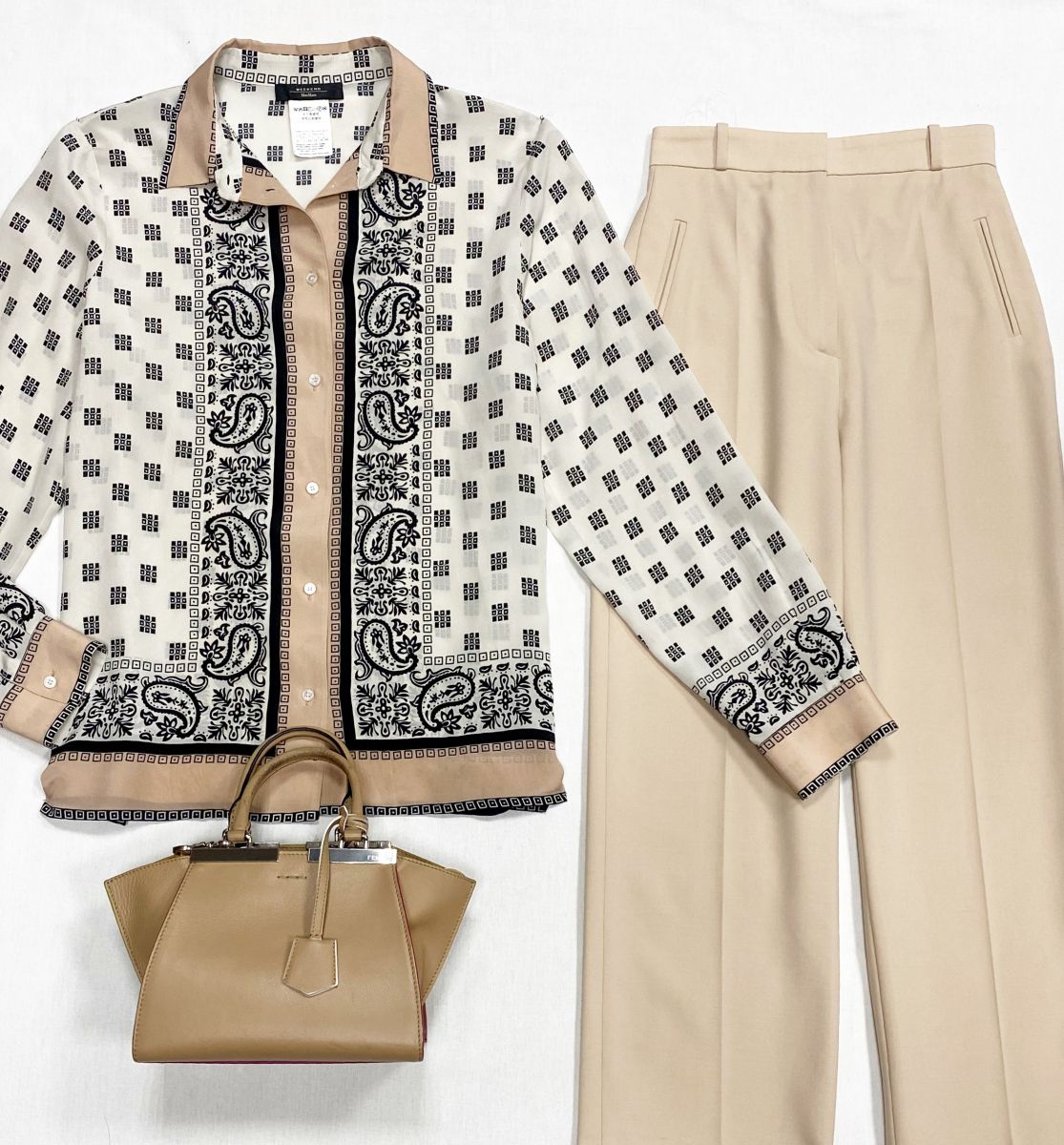 Брюки Jacquemus размер 34 цена 18 786 руб/ с биркой/
Блузка Weekend/ Max Mara размер 46 цена 7 828 руб
Сумочка Fendi