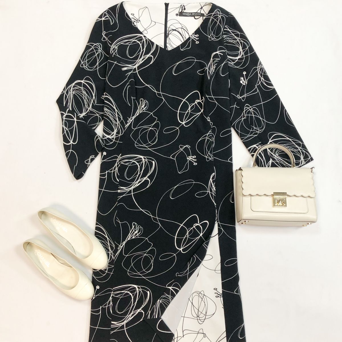 Платье Marina Ronalbi размер 50 цена 4 616 рубТуфли Chanel размер 39 цена 18 462 рубСумка Michael Kors