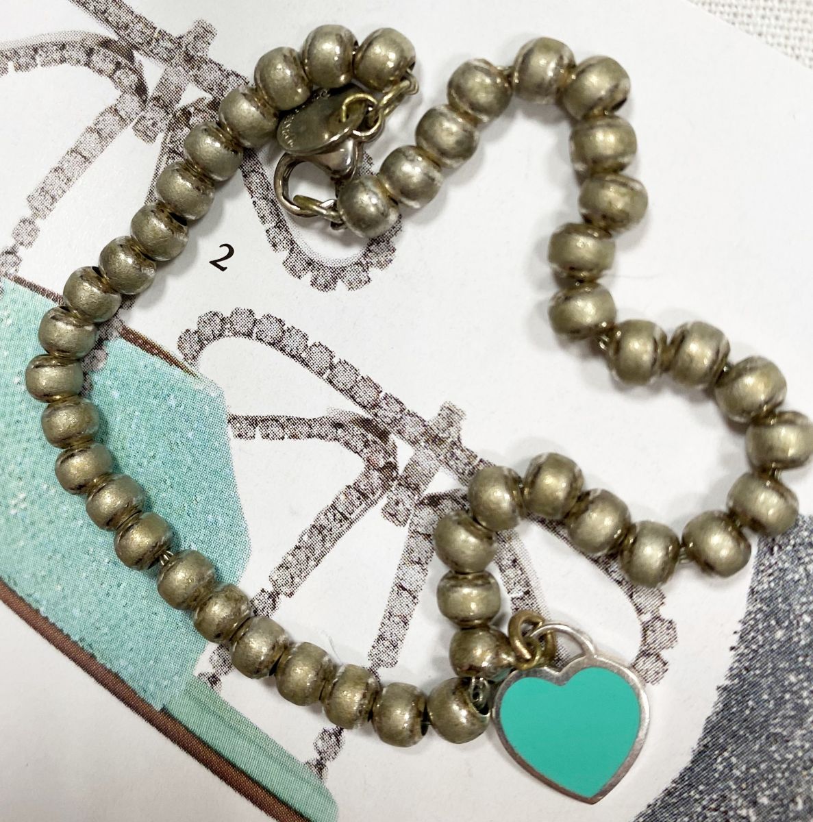 Браслет Tiffany цена 12 524 руб

 