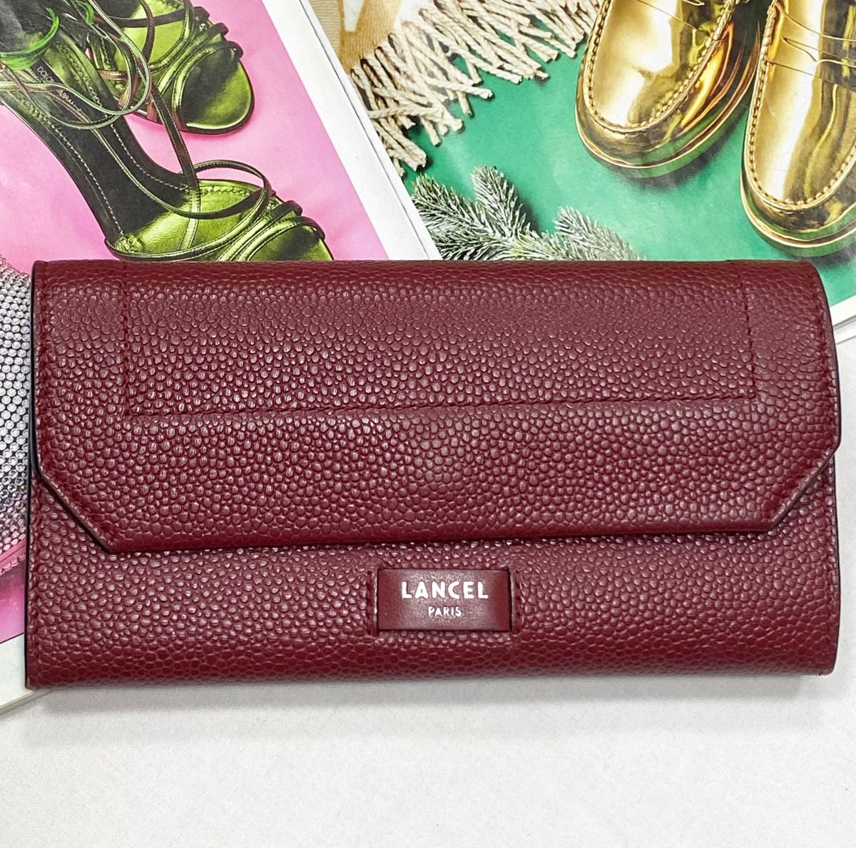 Кошелек Lancel цена 7 828 руб

