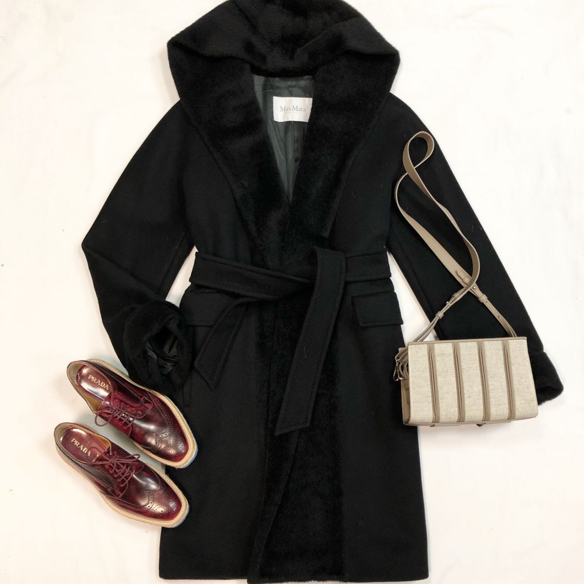 Пальто Max Mara размер 46 цена 18 462 рубБотинки Prada размер 37.5 цена 15 385 рубСумка Max Mara