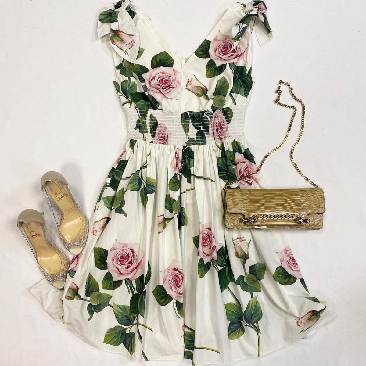 Платье DOLCE GABBANA размер 50 цена 15 385 рубТуфли LOUBUITIN  размер 39 цена 23 078 рубСумка GUCCI 