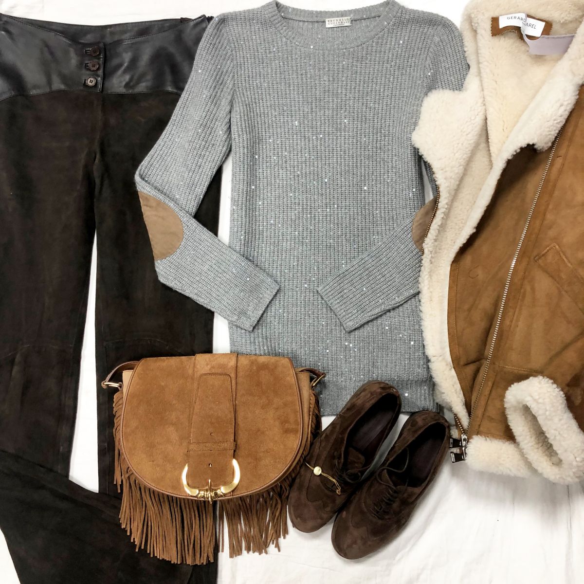 Свитер /кашемир/ Brunello cuccinelli размер L цена 31 310 руб 
Брюки /кожа/замша/ Valentino размер М цена 18 786 руб 
Ботинки LORO PIANA размер 37 цена 36 007 руб /новые/ 
Сумка Celine