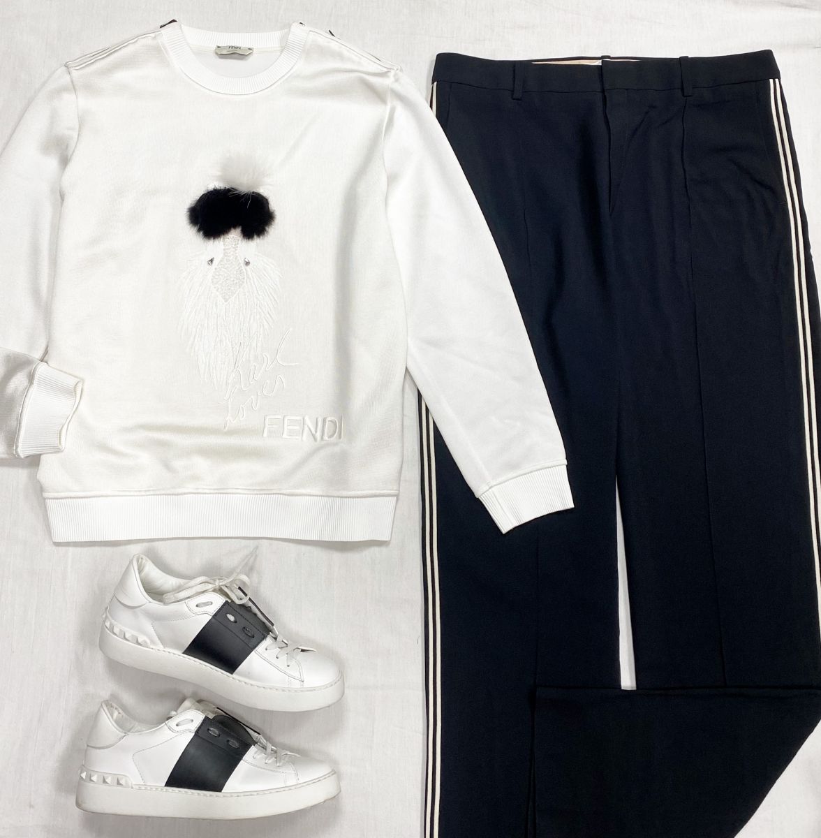 Толстовка Fendi размер 42 цена 23 483 руб Брюки Chloè размер 44 цена 15 655 руб Кеды Valentino размер 39.5 цена 18 786 руб