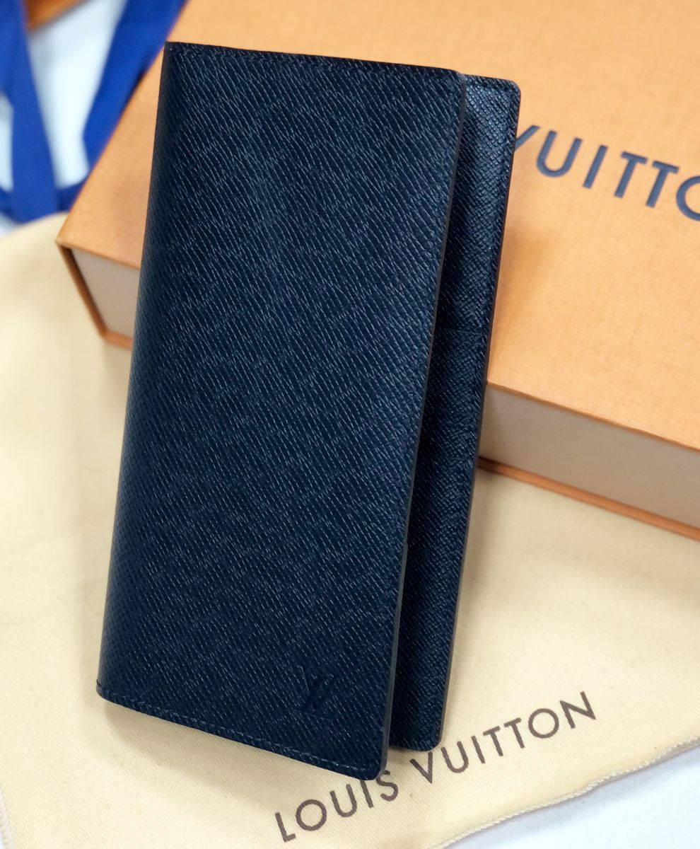 Кошелек Louis Vuitton цена 23 462 руб
