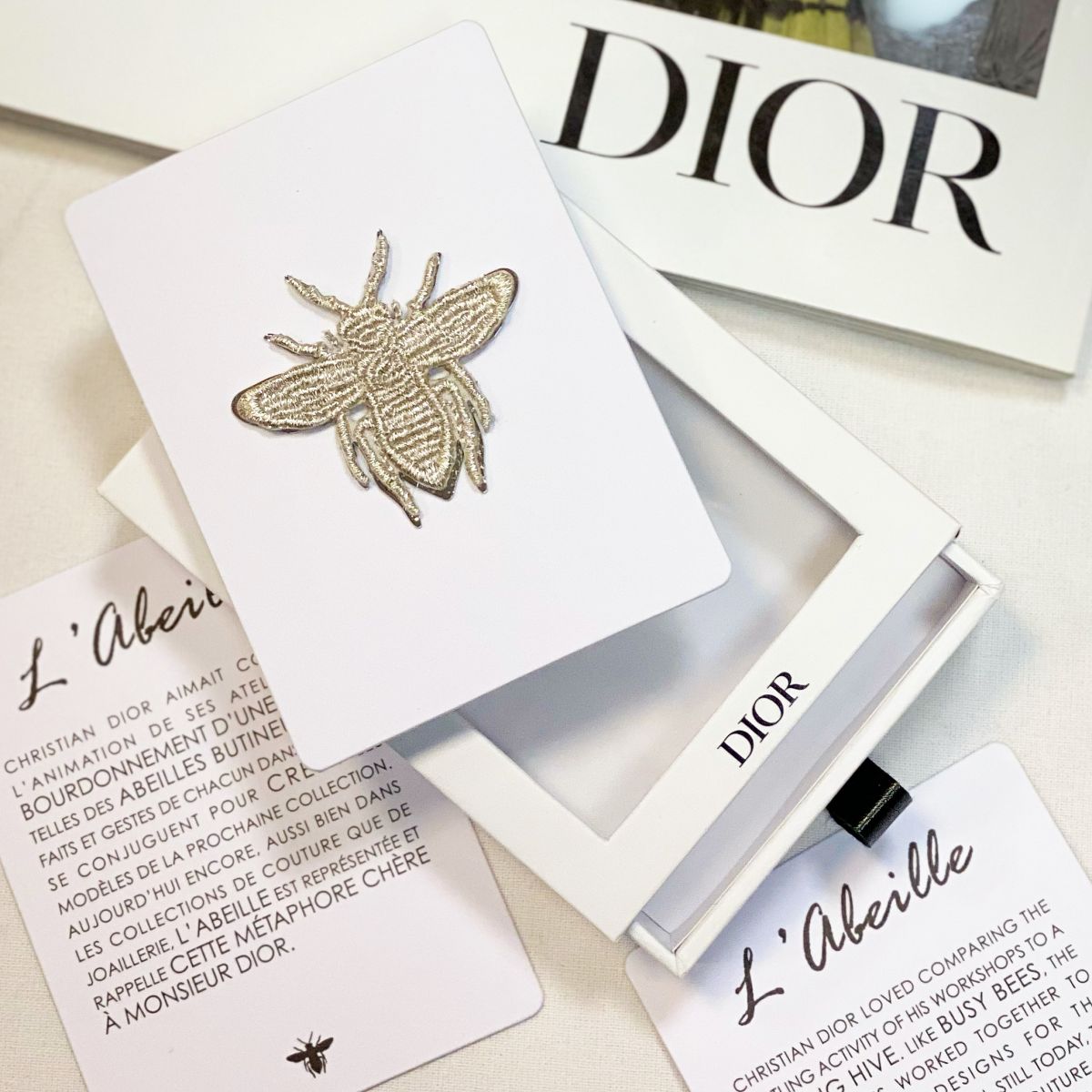 Dior bee pin deals