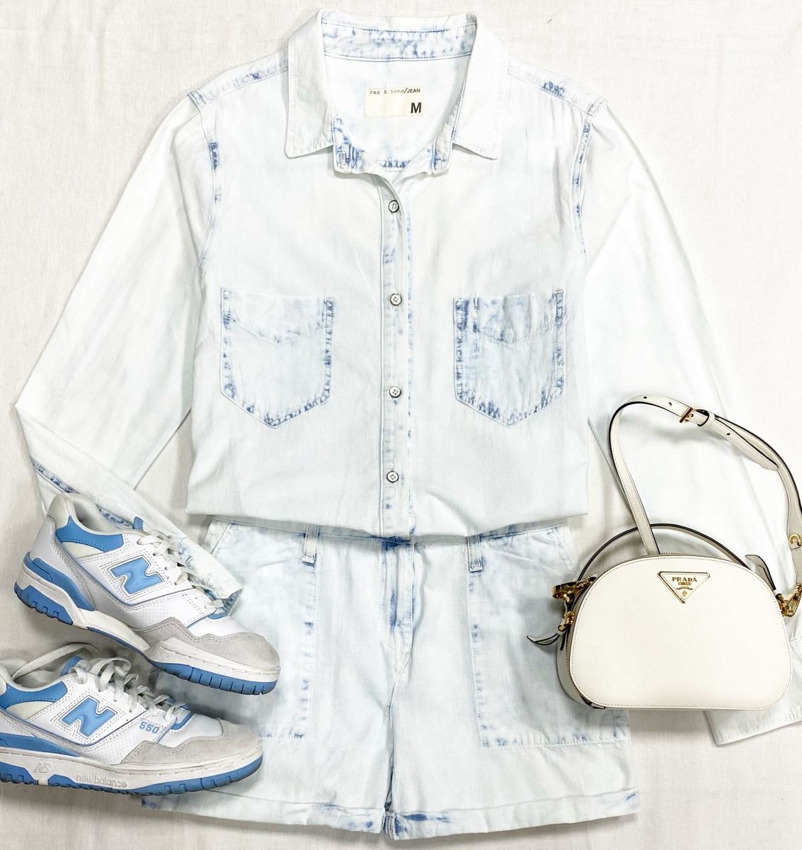 Комбинезон Rag Bone размер M цена 7 828 руб
Кроссовки New Balance размер 40 цена 9 393 руб
Сумка Prada 