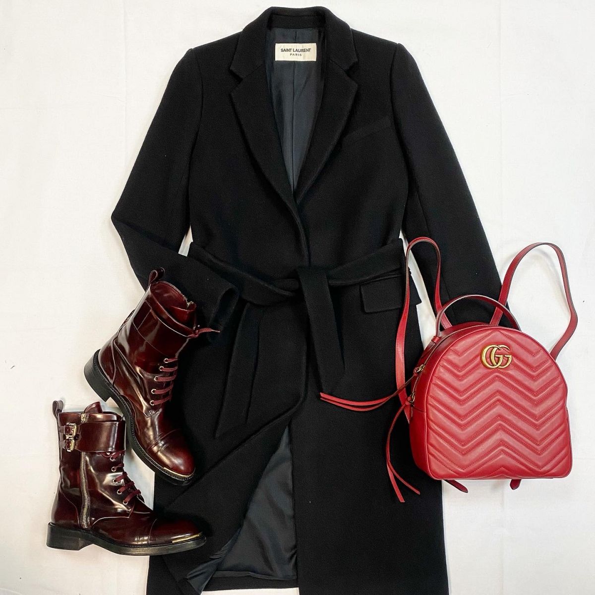 Пальто Saint Laurent размер 36 цена 76 925 руб Ботинки Louis Vuitton размер 38.5 цена 18 463 руб Рюкзак Gucci