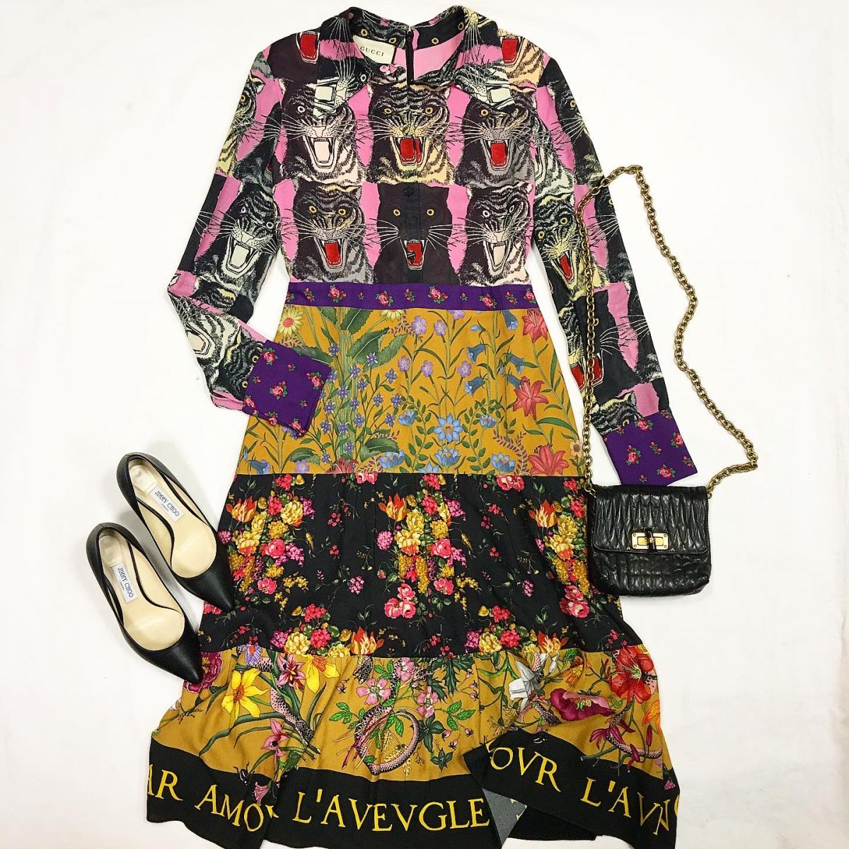 Платье Gucci размер 44 цена 26 155 рубТуфли Jimmy Choo размер 37.5 цена 7 693 руб Сумка Lanvin 