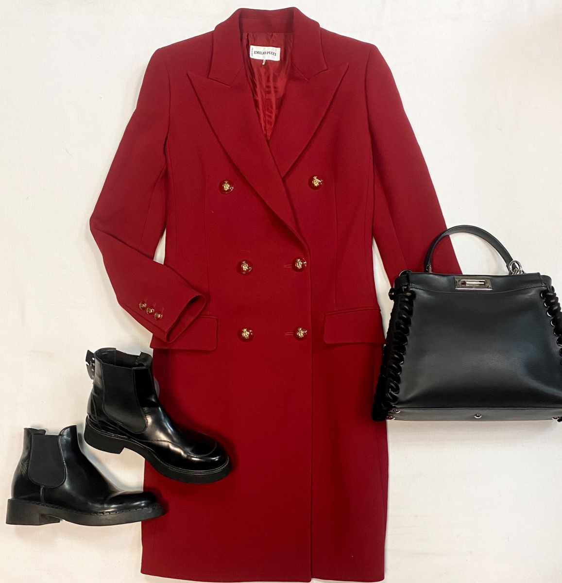 Пальто Emilio Pucci размер 42 цена 30 770 руб
Ботинки Prada размер 38 цена 23 078 руб
Сумка Fendi 