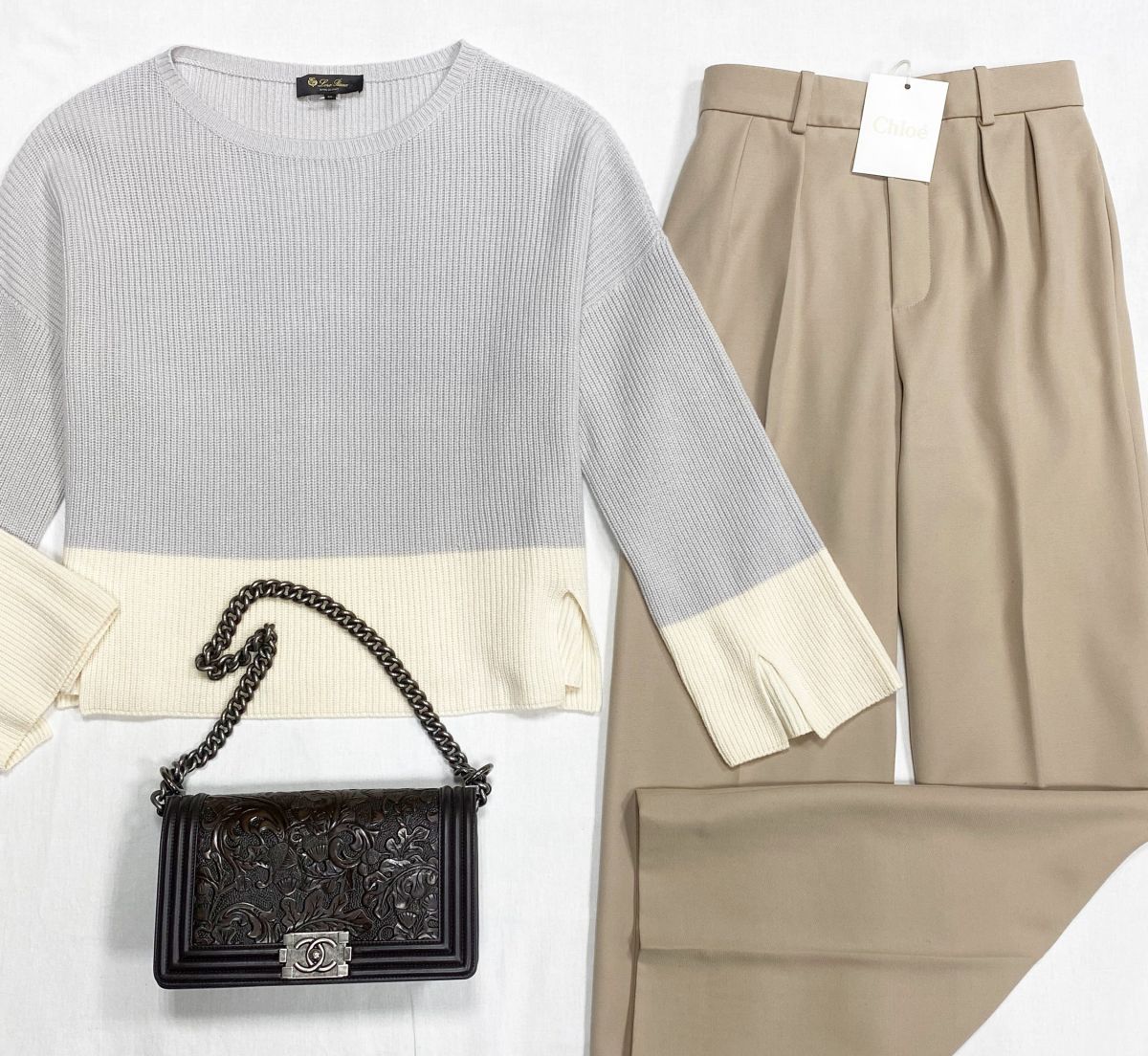 Кофта Loro Piana размер M цена 30 770 руб
Брюки Chloe размер 36 цена 15 385 руб
Сумка Chanel 