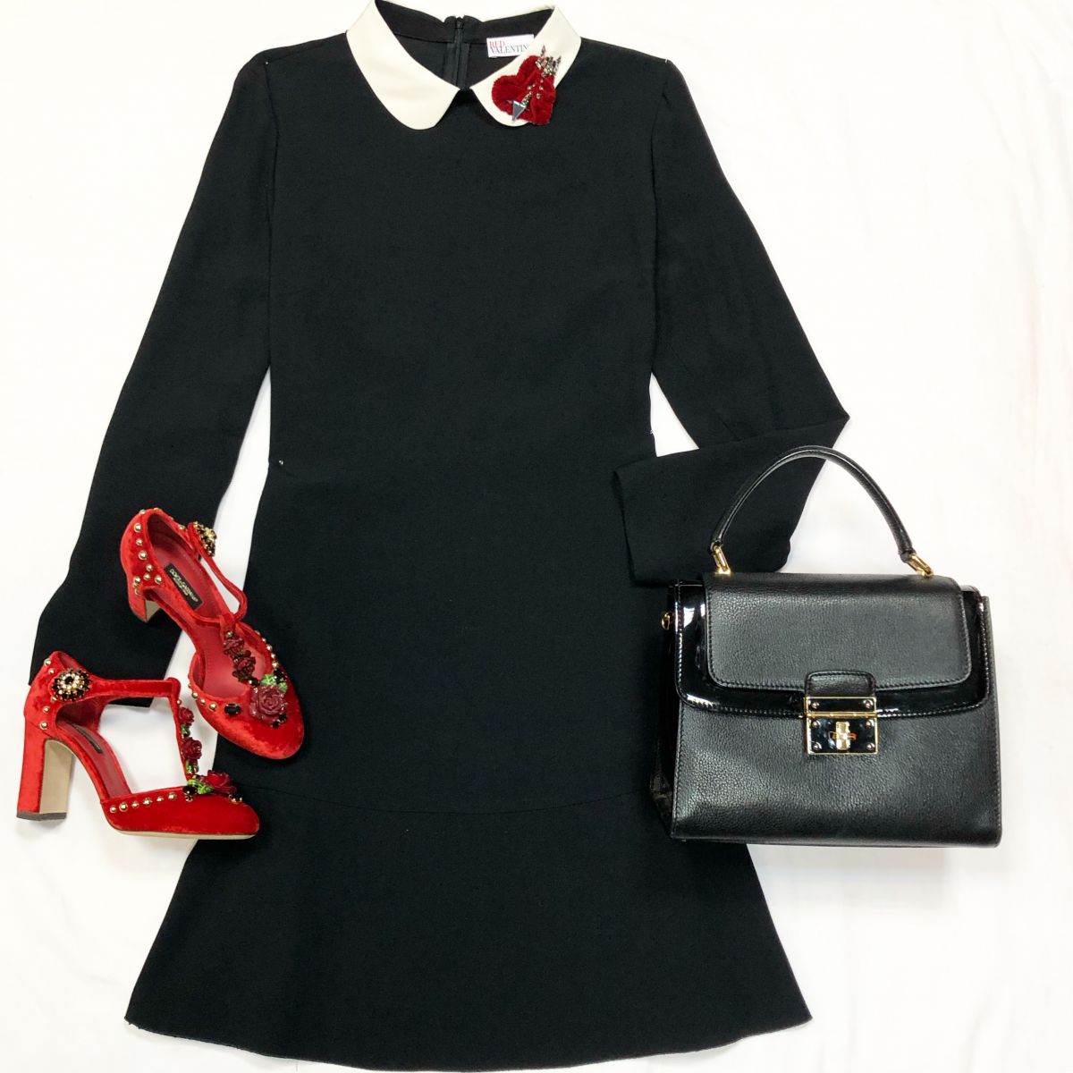 Платье Red Valentino размер 48 цена 9 231 руб Туфли Dolce Gabbana размер 36 цена 23 078 рубСумка Dolce Gabbana