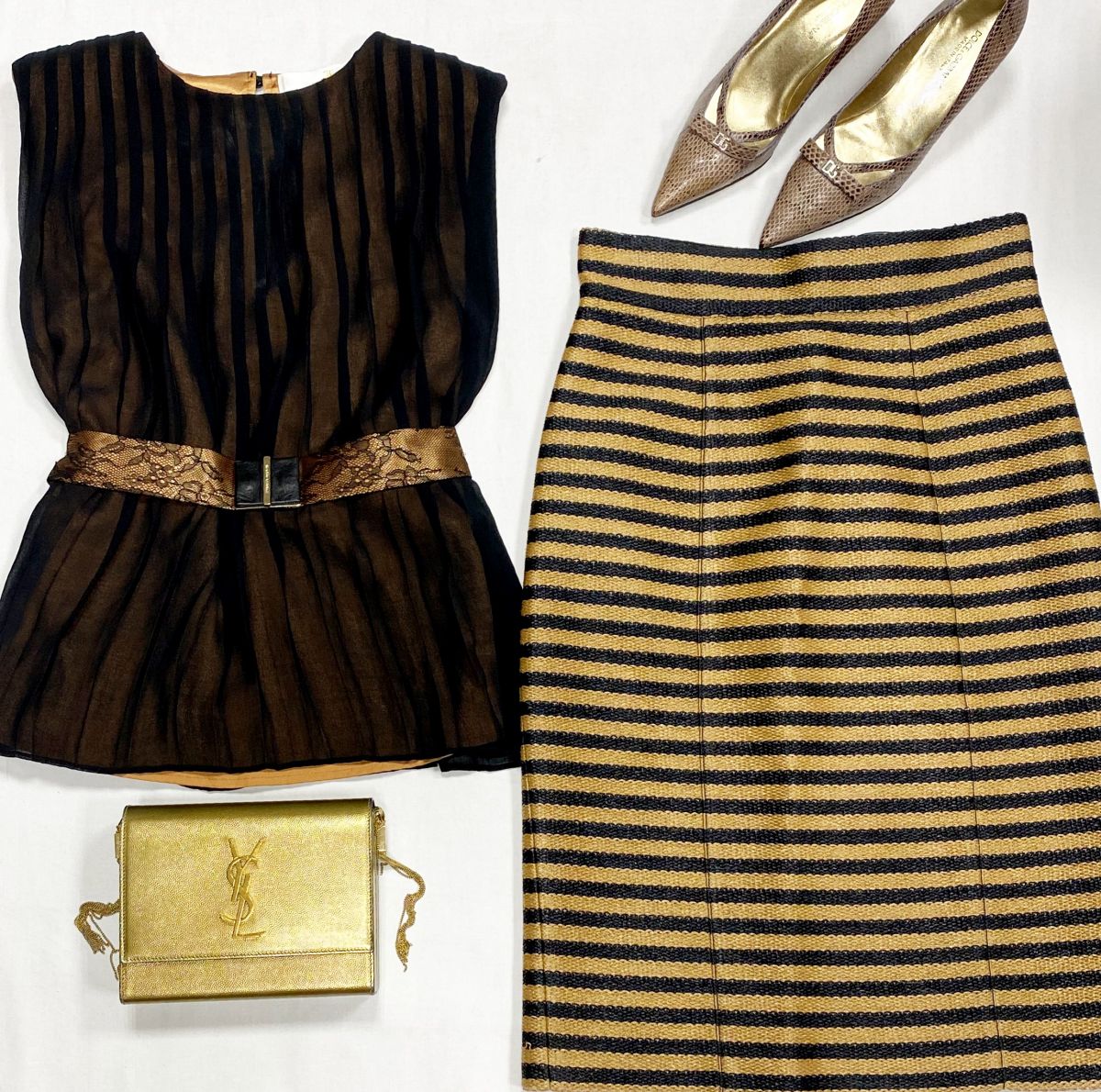 Юбка Burberry размер 42 цена 15 655 руб
Блузка Elisabetta Franchi размер 42 цена 6 262 руб
Туфли Dolce Gabbana размер 36.5 цена 15 655 руб
Сумочка Saint Laurent 