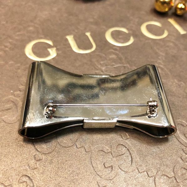 Брошка Gucci 