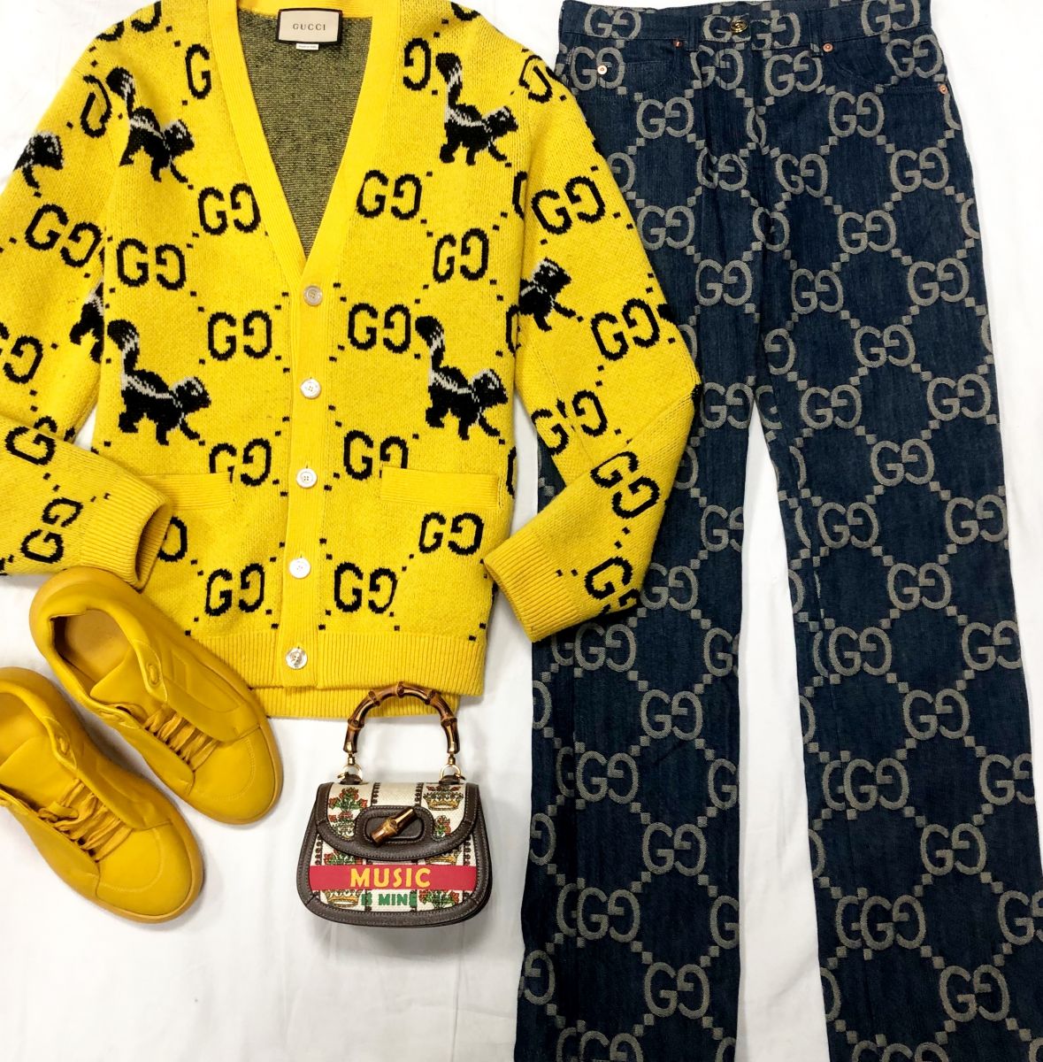 Кардиган GUCCI размер S цена 78 275 руб 
Джинсы GUCCI размер 28 цена 31 310 руб 
Сумочка GUCCI