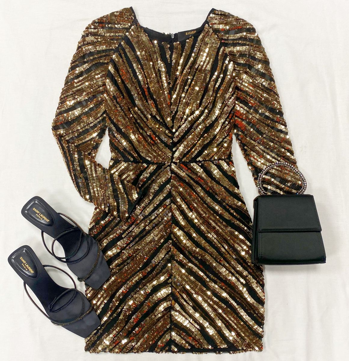 Платье / пайетки / Rasario размер 42 цена 30 770 руб 
Босоножки Saint Laurent размер 40 цена 23 078 руб 
Сумочка Rixo