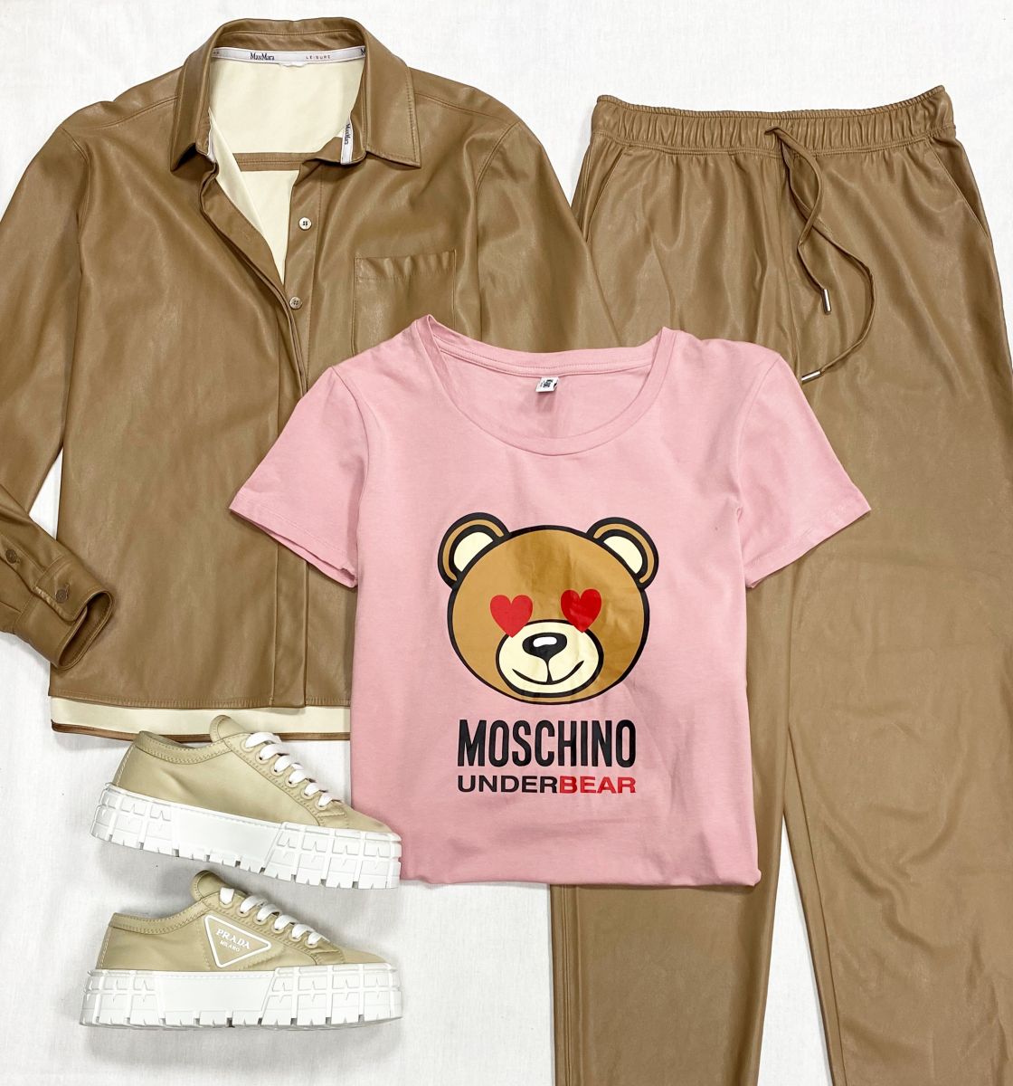 Костюм Max Mara размер 42 цена 18 786 руб
Футболка Moschino размер M цена 6 262 руб
Кеды Prada размер 37 цена 46 965 руб
