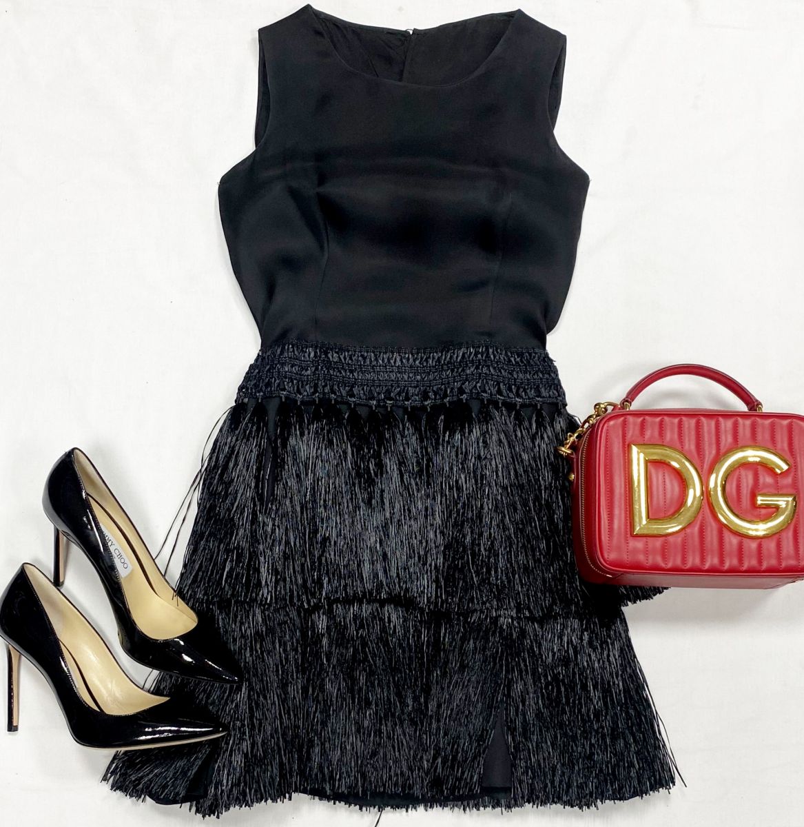 Платье Prada размер 38 цена 23 483 рубТуфли Jimmy Choo размер 39.5 цена 23 483 рубСумка Dolce Gabbana