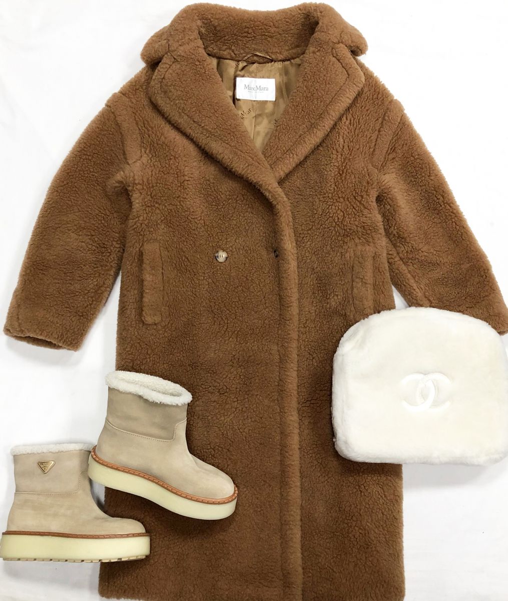 Пальто Max Mara размер L цена 62 620 руб
Ботинки Prada размер 38 цена 78 275 руб
Клатч Chanel