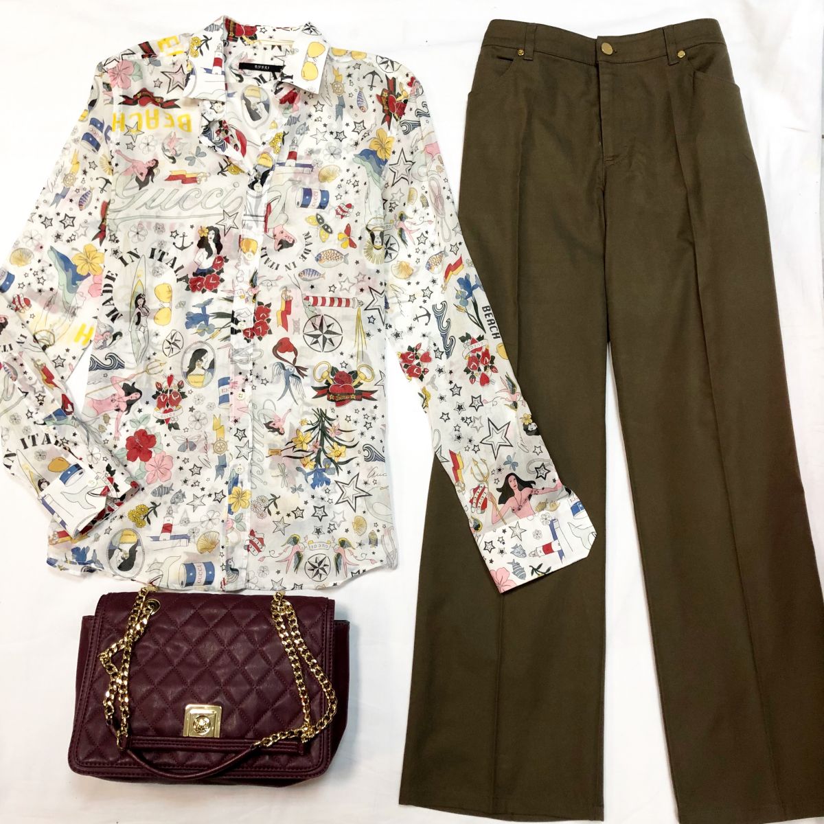 Рубашка GUCCI размер 39/15.1/2 цена 4 616 руб 
Брюки EDCADA размер 44 цена 4 626 руб 
Сумка Moschino