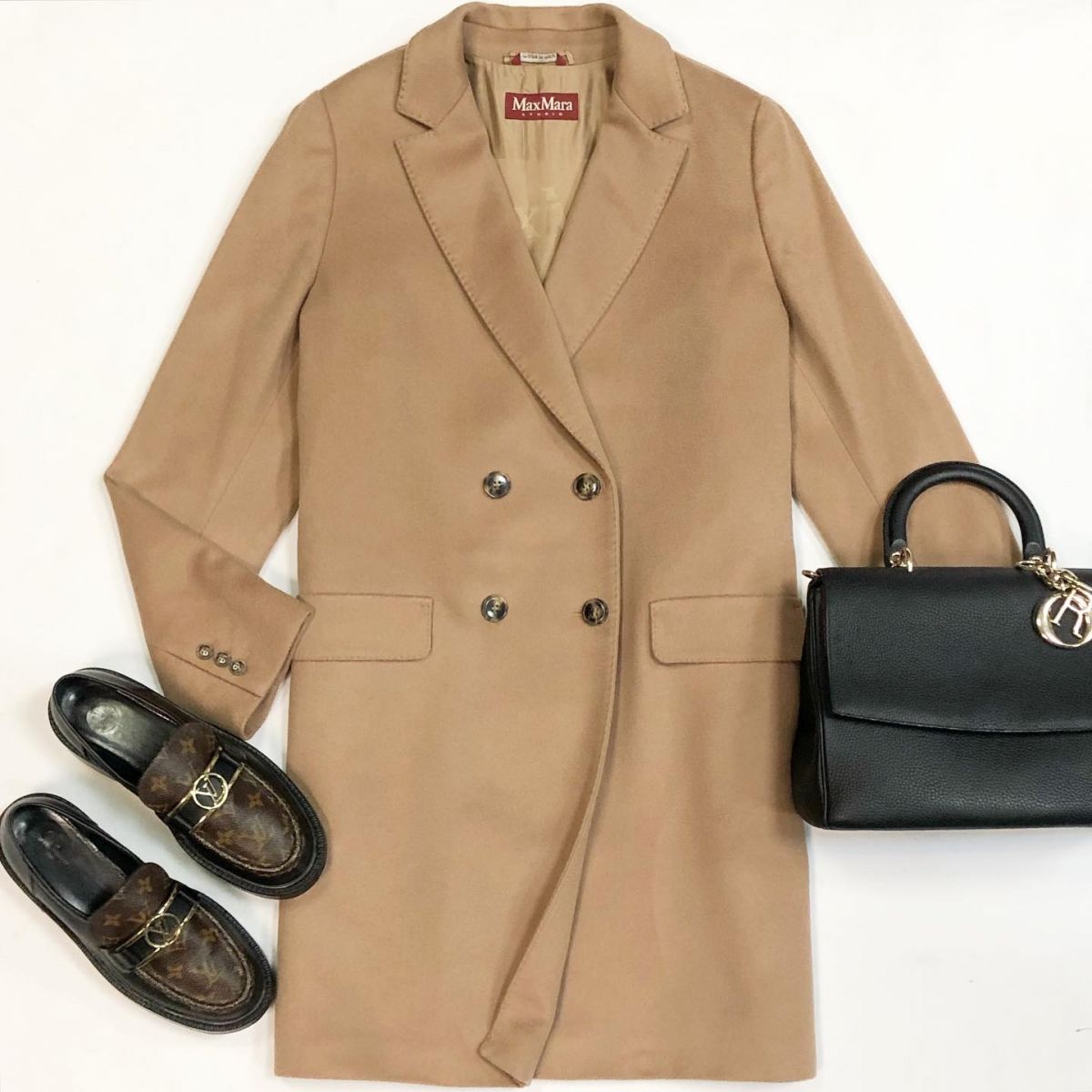 Пальто Max Mara размер 50 цена 61 540 рубЛоферы Louis Vuitton размер 41 цена 53 848 рубСумка Dior