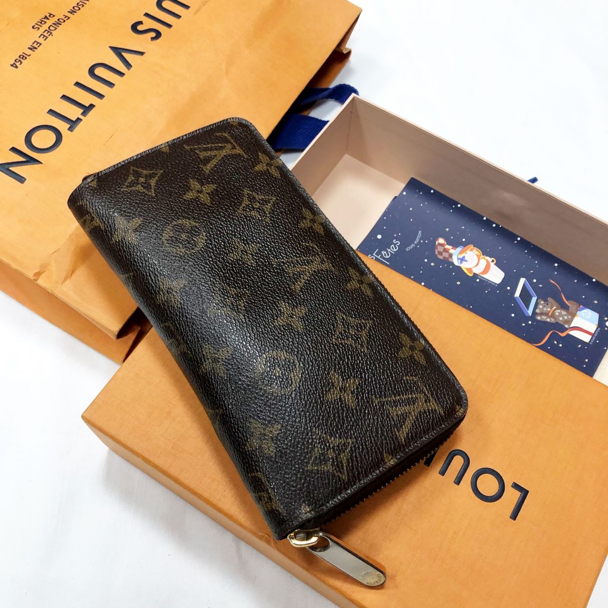 Кошелек LOUIS VUITTON цена 13 847 руб