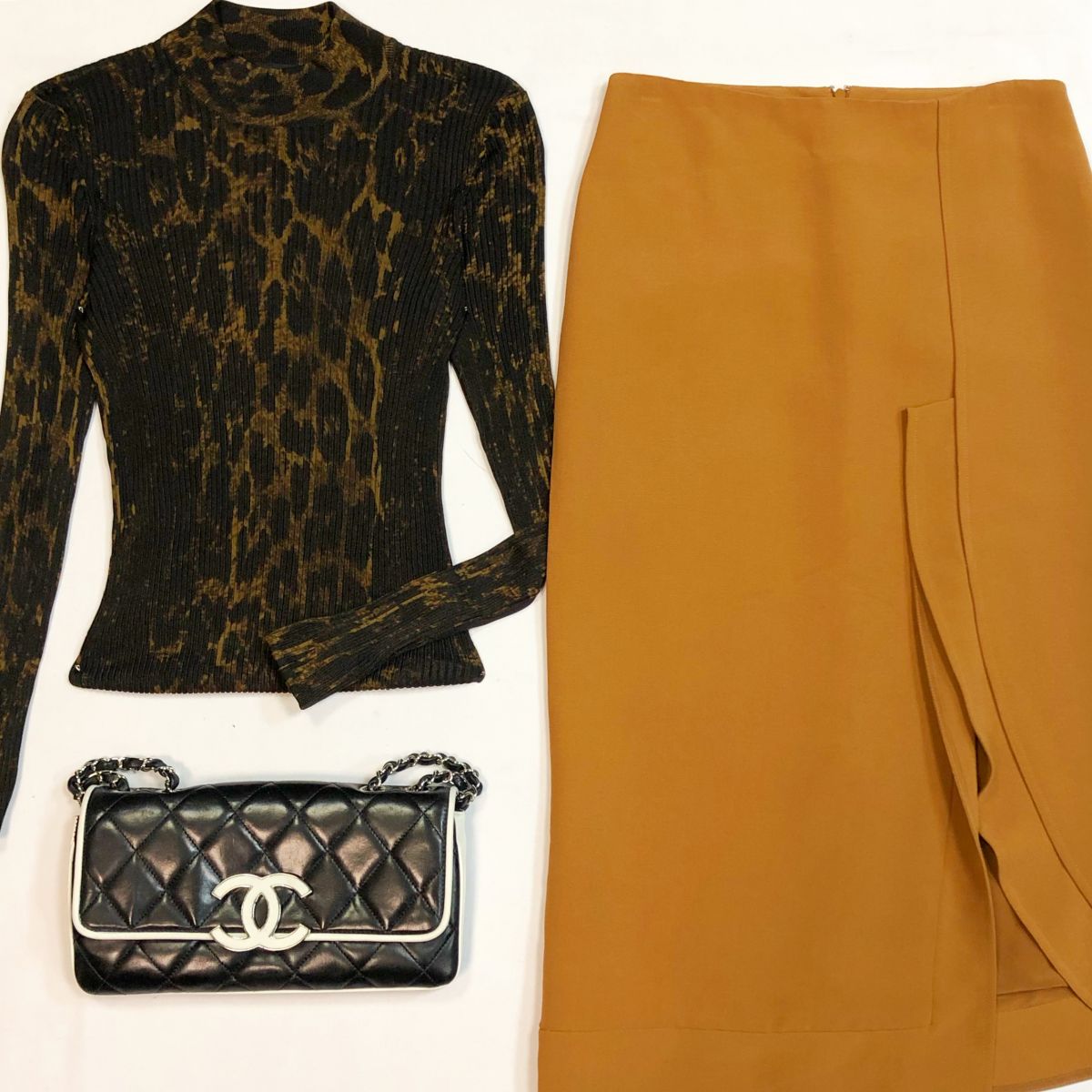 Водолазка Tom Ford размер XS цена 23 078 рубЮбка Victoria Beckham размер 40 цена 15 385 рубСумка Chanel