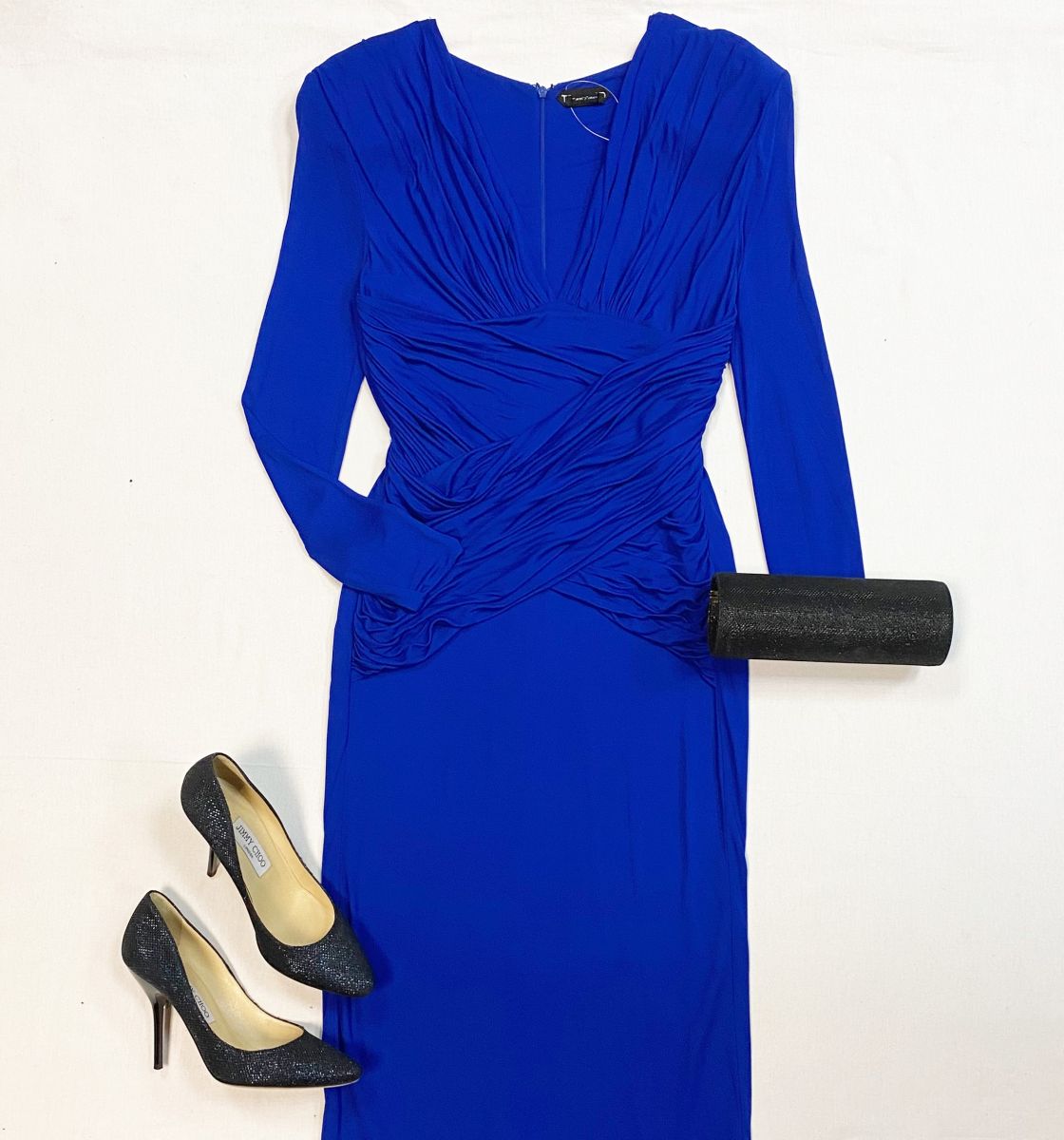Платье Tom Ford размер 42 цена 30 770 руб
Туфли Jimmy Choo размер 37 цена 15 385 руб
Клатч Jimmy Choo