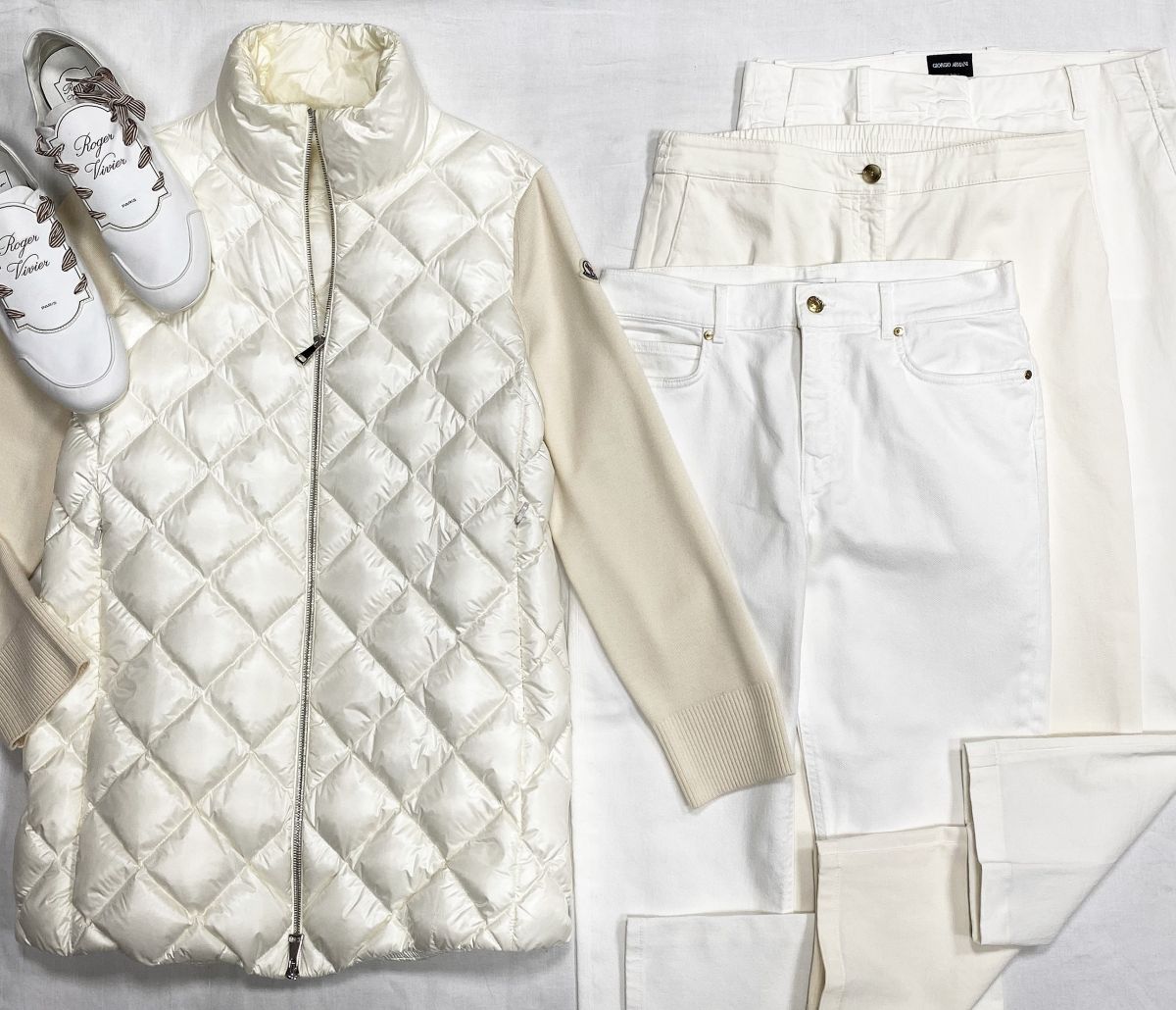 Куртка Moncler размер L цена 31 310 руб 
Брюки Giorgio Armani / Escada / Boss размер 42 цена от 4 697 руб до 7 828 руб 
Кеды Roger Vivier размер 41 цена 23 483 руб 