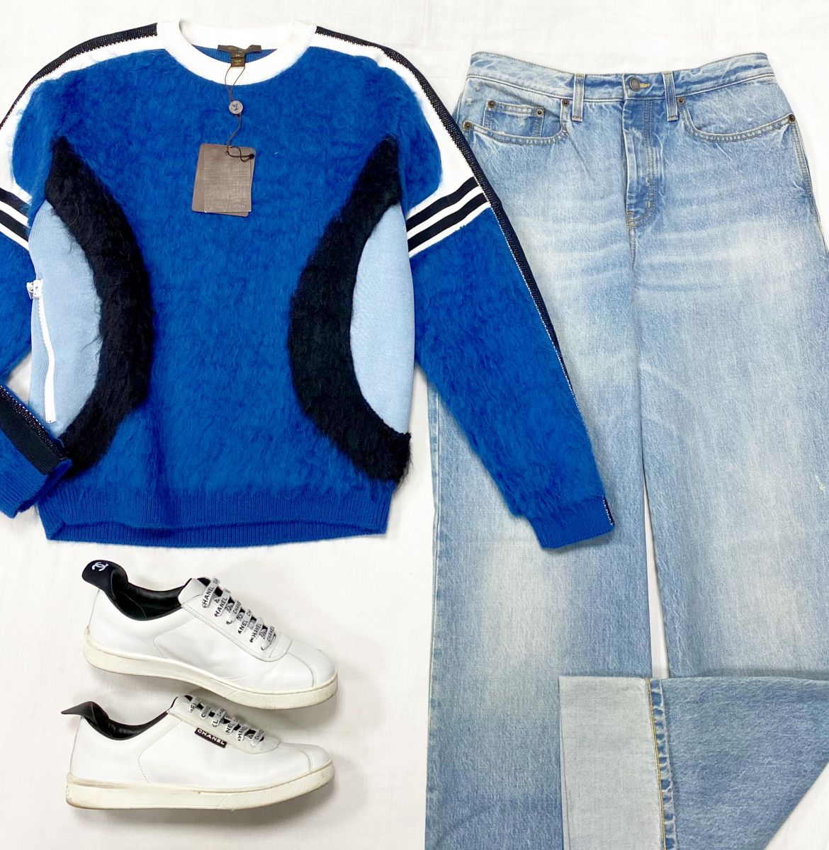 Свитер Louis Vuitton размер M цена 23 483 руб / с биркой / 
Джинсы Saint Laurent размер 28 цена 23 483 руб 
Кеды Chanel размер 39 цена 78 275 руб