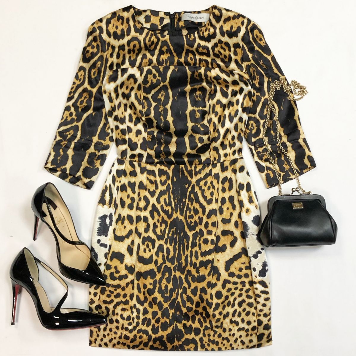Платье Ysl размер 38 цена 10 770 рубБотинки Louboutin размер 37.5 цена 15 385 рубСумка Dolce Gabbana