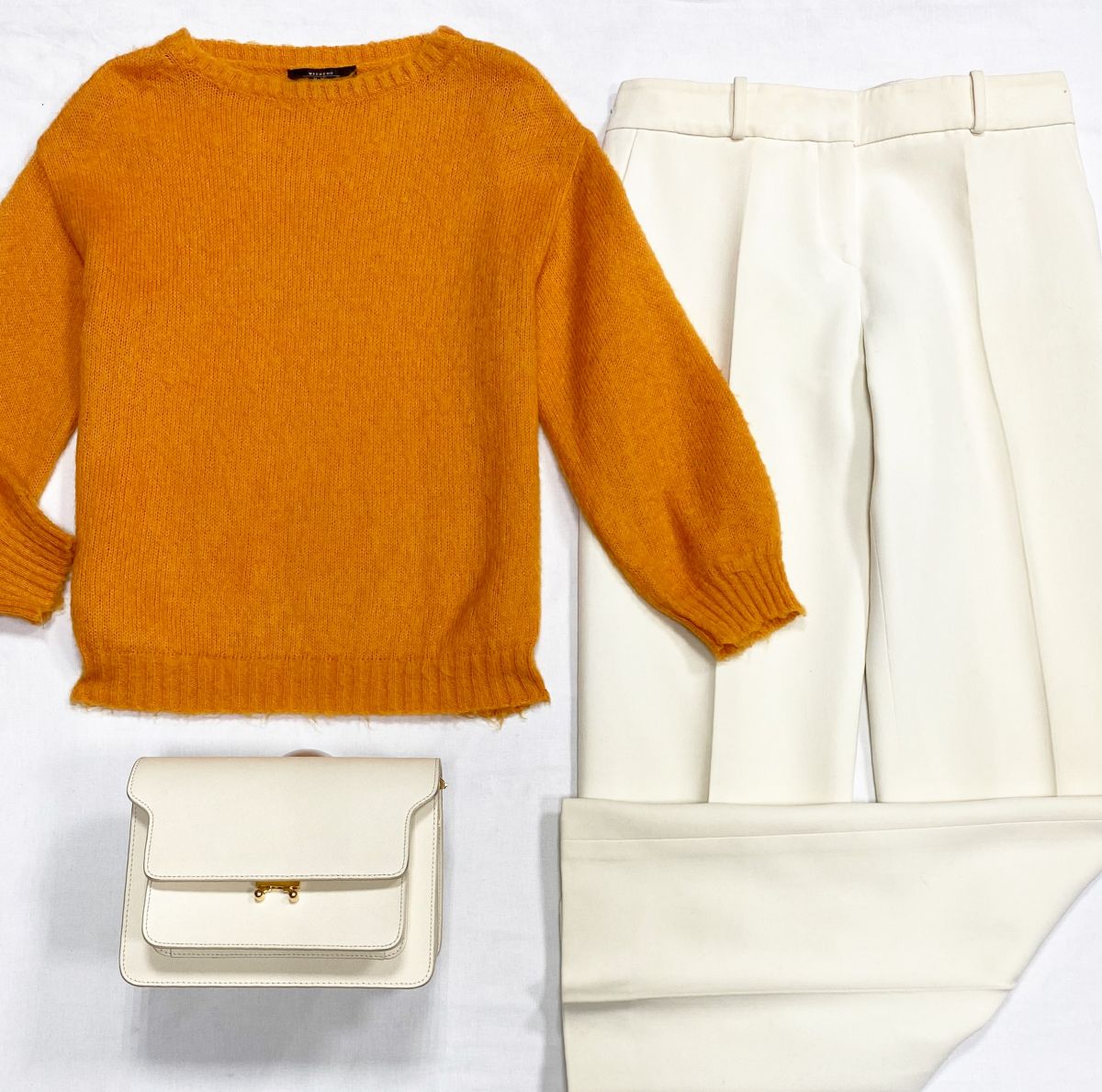 Брюки Armani размер 46 цена 10 959 руб
Кофта Weekend/ Max Mara размер 42 цена 4 697 руб
Сумка Marni