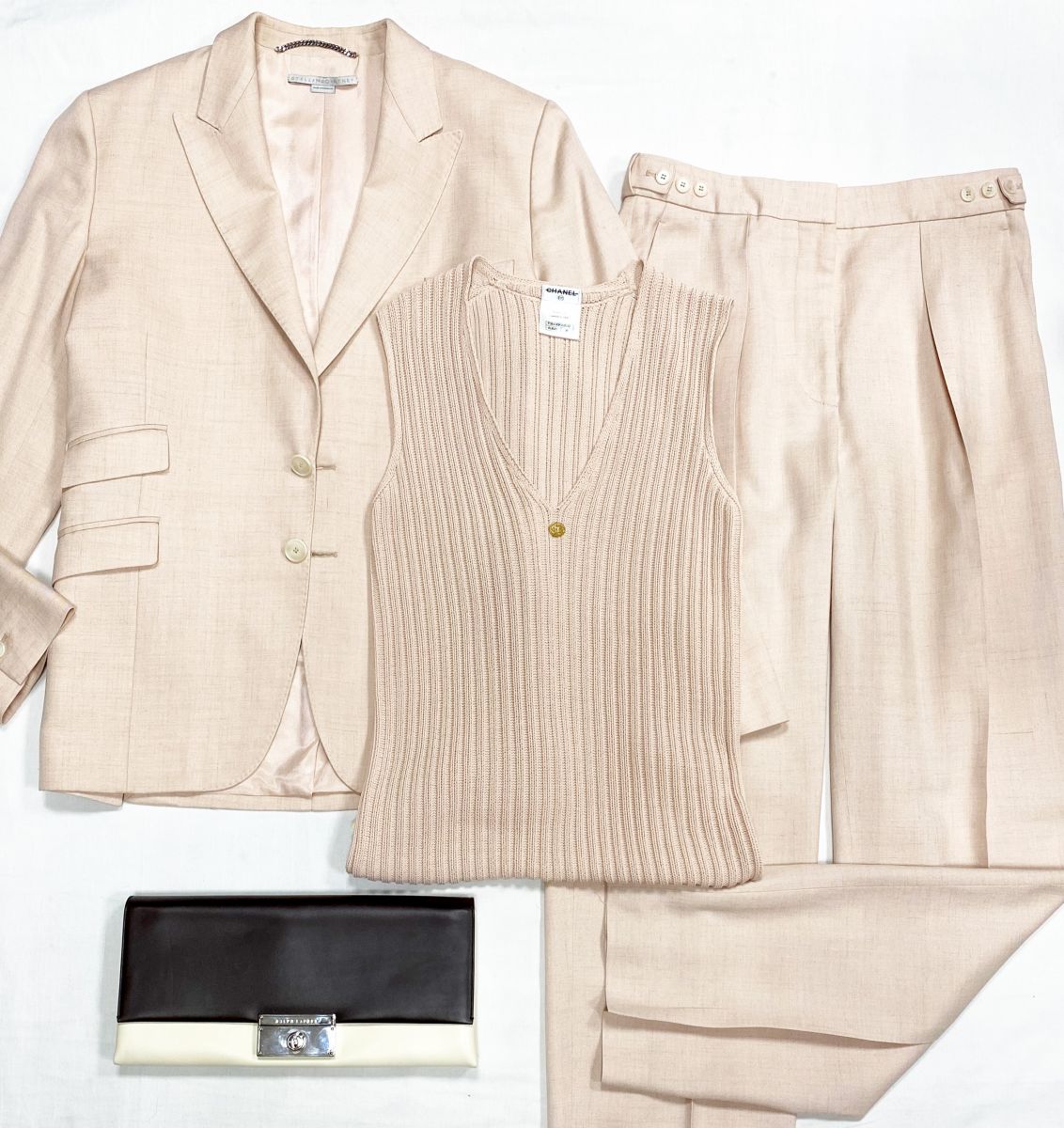Костюм Stella McCartney размер 42 цена 36 007 руб
Топ Chanel размер 38 цена 31 310 руб
Клатч Ralph Lauren 