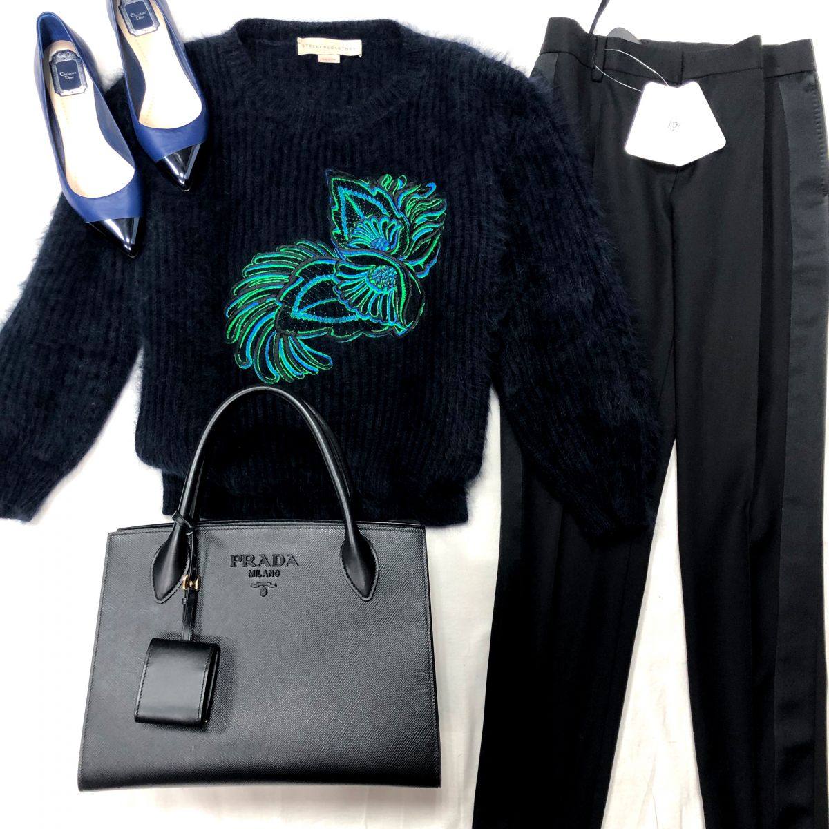 Свитер STELLA MCCARTNEY размер 42 цена 15 655 руб 
Брюки TOM FORD размер 38 цена 15 655 руб 
Сумка PRADA