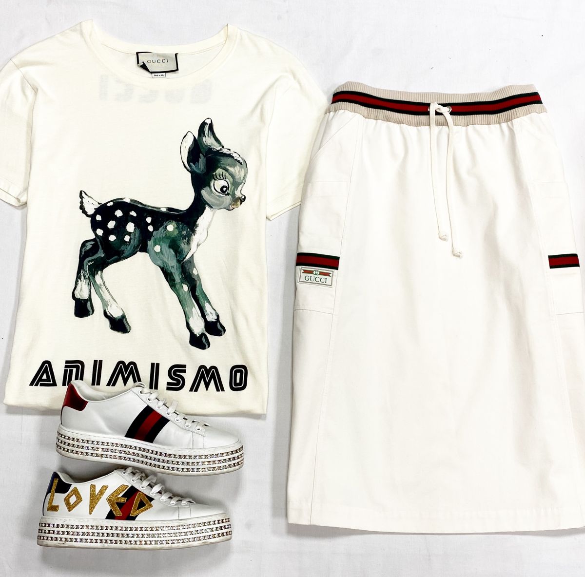 Юбка Gucci размер M цена 15 655 руб
Футболка Gucci размер XS цена 23 483 руб
Кеды Gucci размер 37.5 цена 31 310 руб