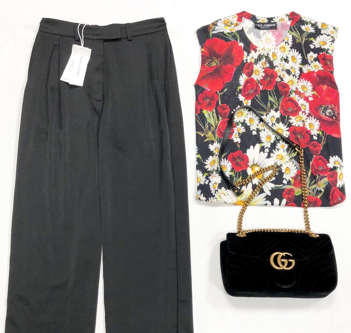 Топ Dolce Gabbana размер 42 цена 7 693 руб
Брюки размер L цена 4 616 руб
Сумка Gucci