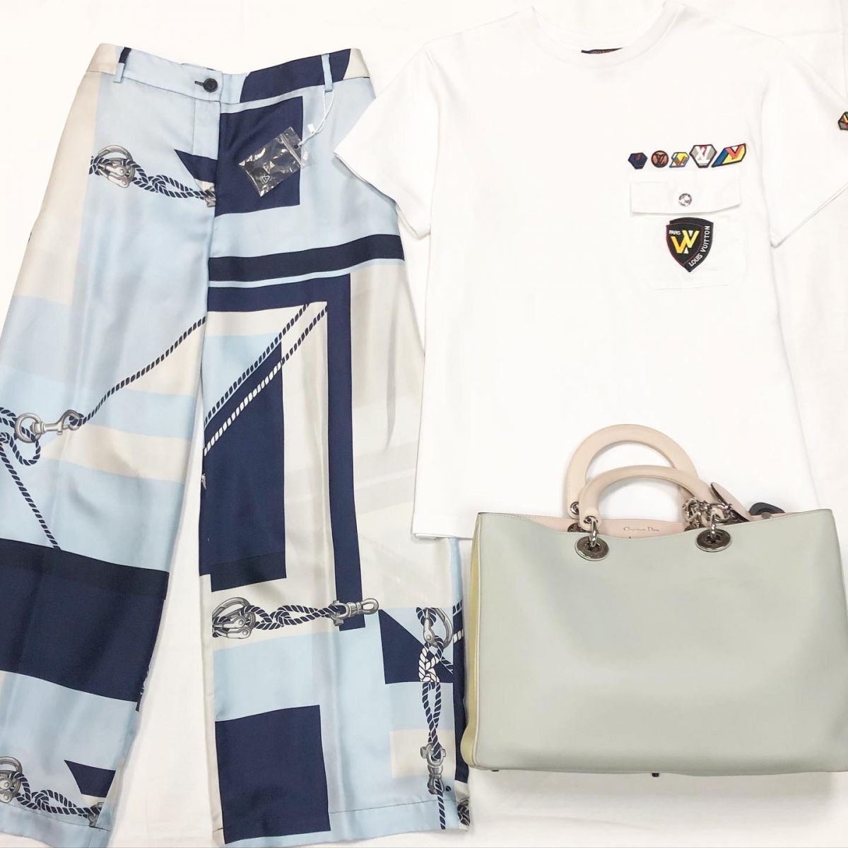 Футболка Louis Vuitton размер L цена 15 385 руб Брюки /шёлк/ Weekend размер 42/46 цена 7 693 руб Сумка Christian Dior