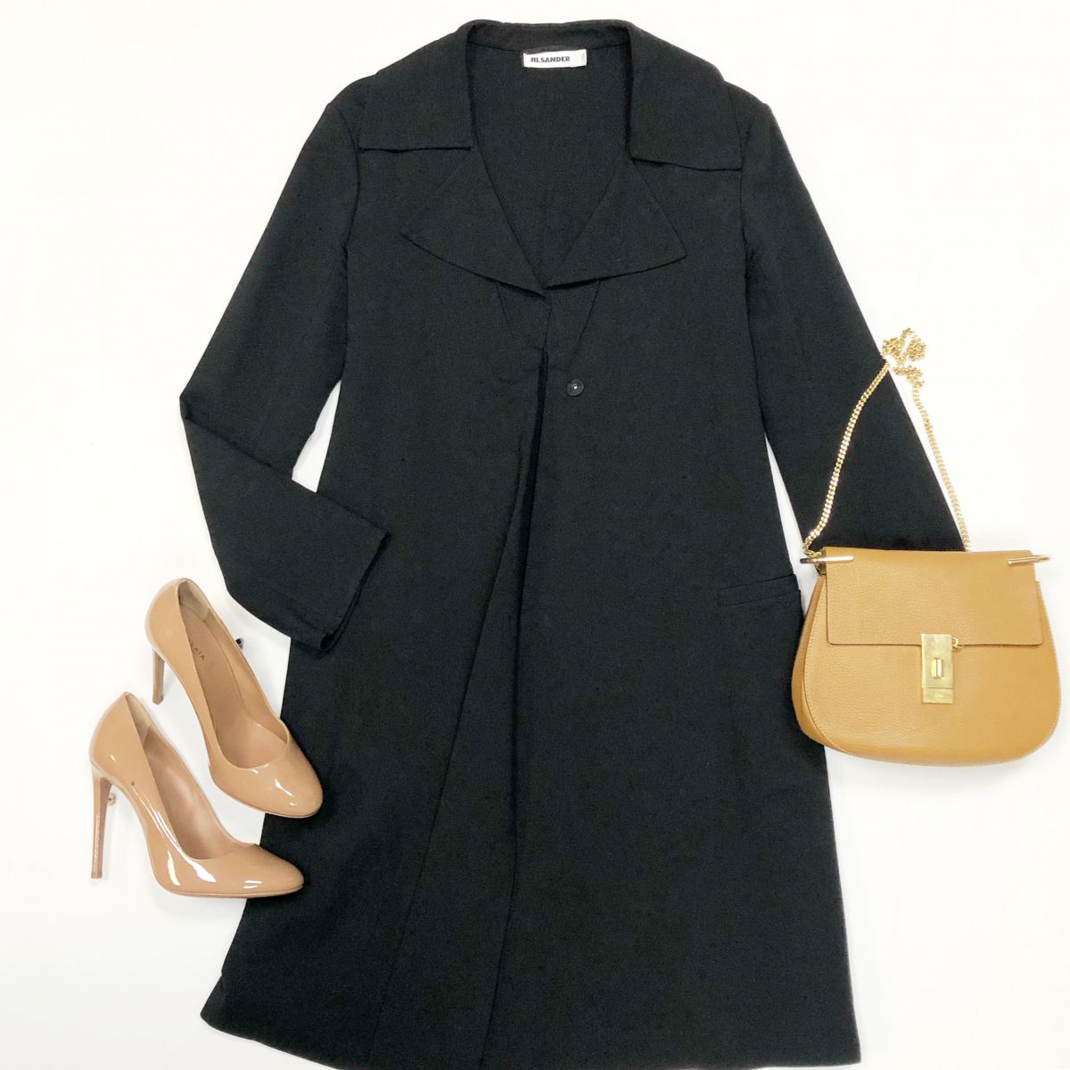 Пальто Jil Sander размер 38 цена 10 770 рубТуфли Alaia размер 40 цена 7 693 рубСумка Chloe