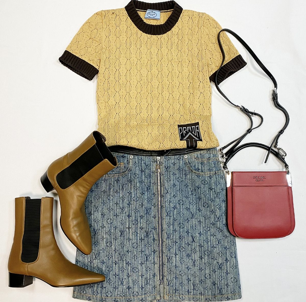Юбка / отделка кожи / Louis Vuitton размер 40 цена 30 770 руб Кофта Prada размер 40 цена 9 231 руб Ботинки The Row размер 40 цена 38 463 рубСумка Prada