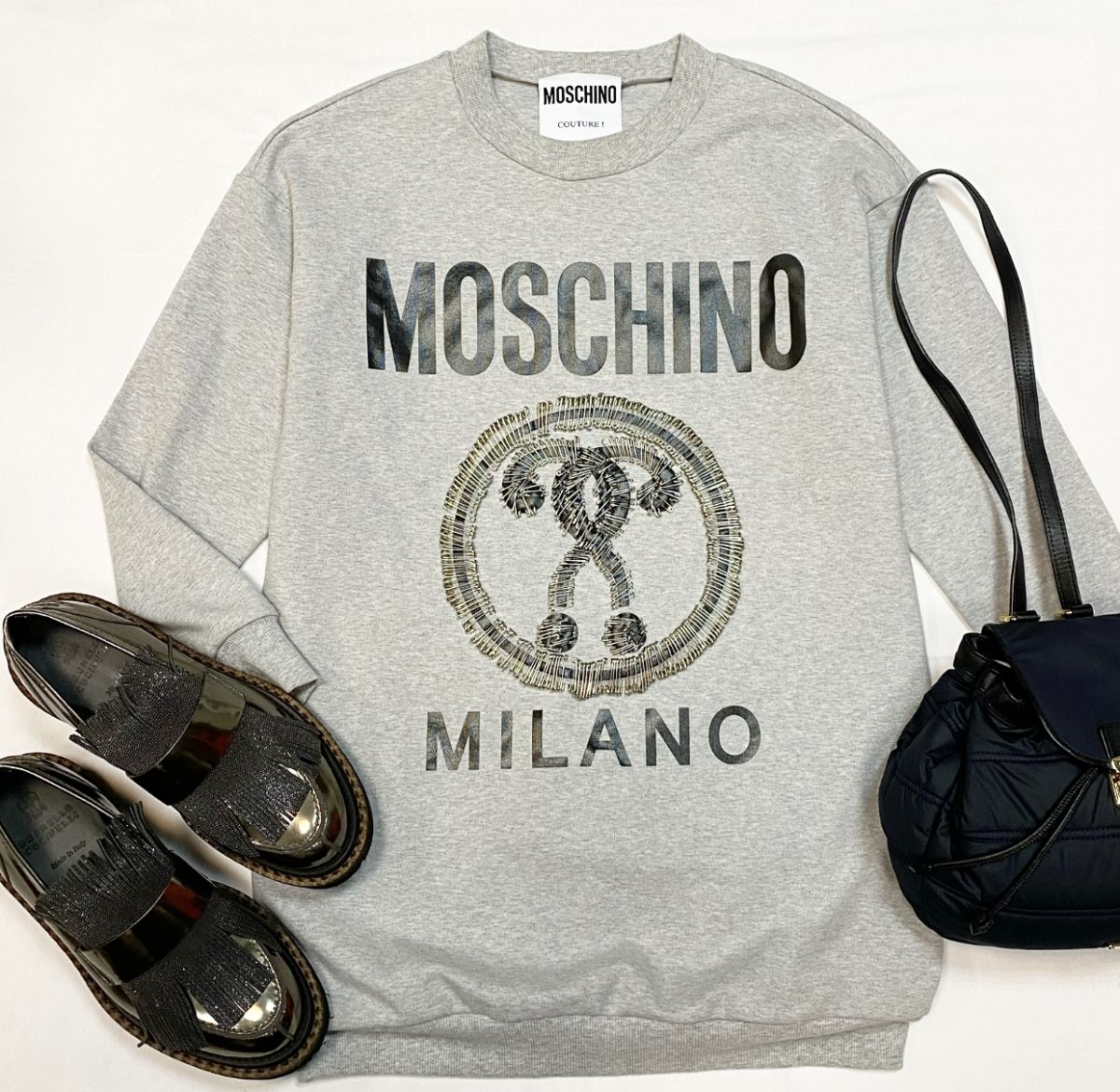 Толстовка Moschino размер 36 цена 9 231 рубЛоферы Brunello Cucinelli размер 40 цена 18 463 рубРюкзак Burberry