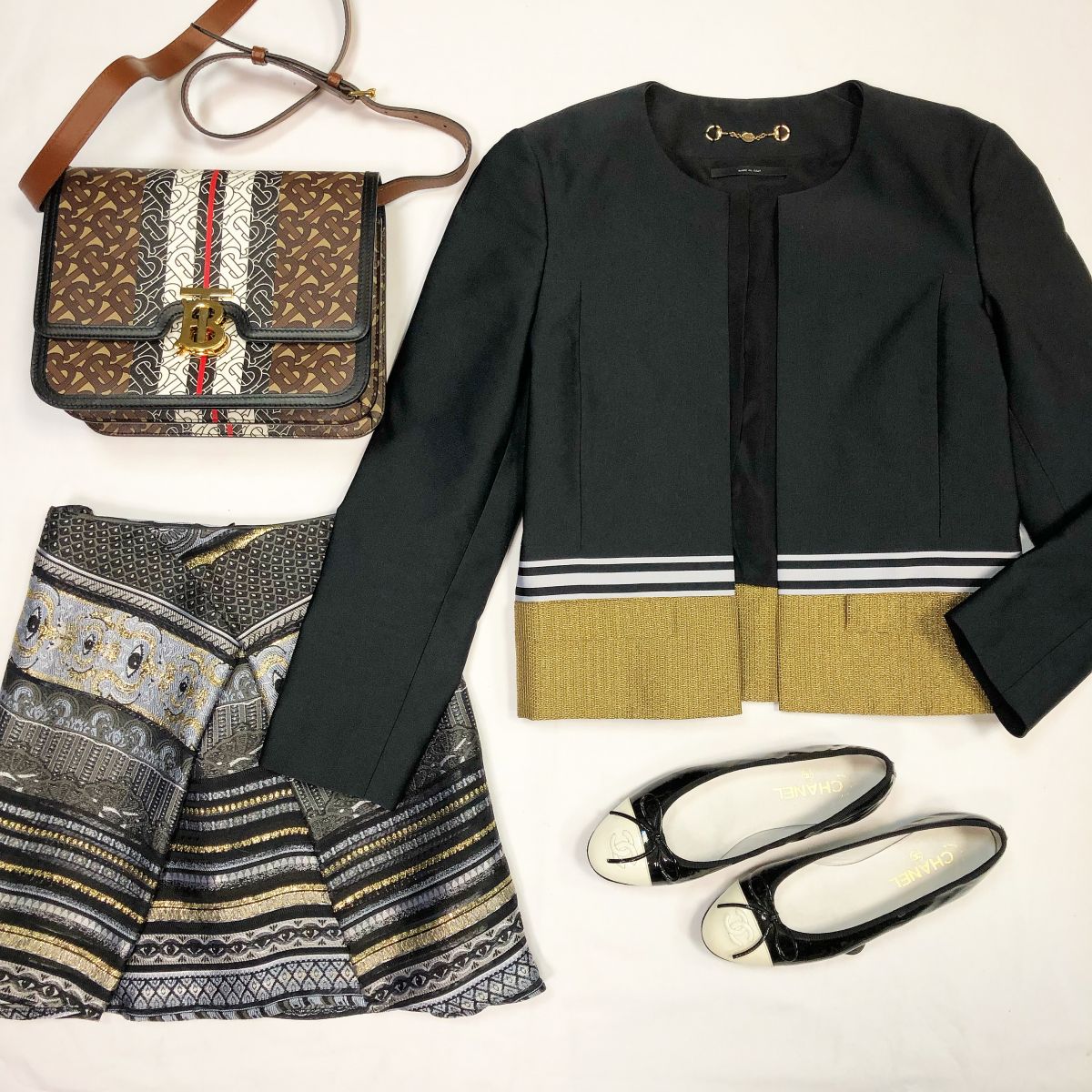 Жакет Gucci размер 40 / 44 / цена 12 308 руб Юбка Kenzo размер 38 цена 4 616 рубБалетки Chanel размер 38 цена 30 770 руб Сумка Burberry 