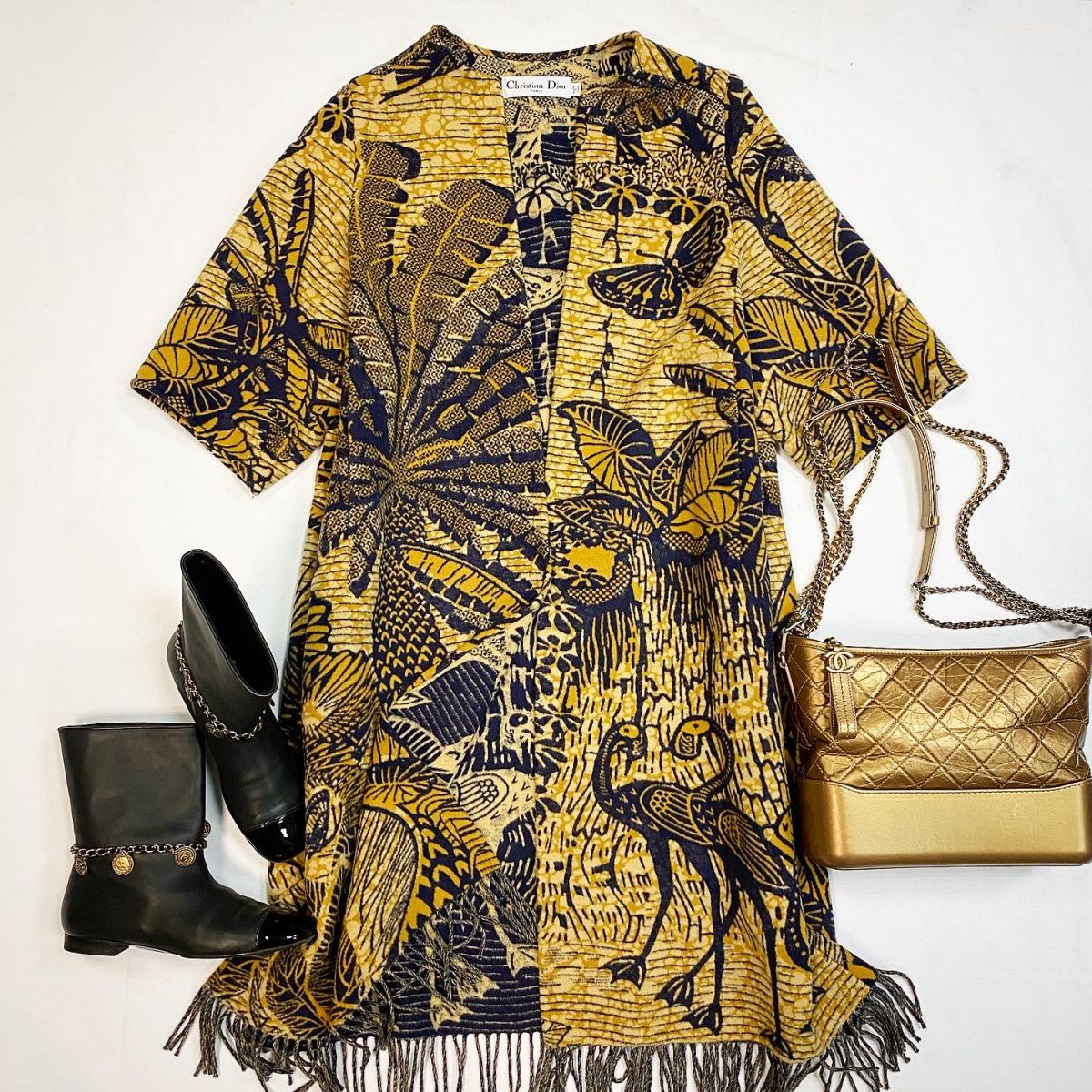 Пальто Christian Dior размер 34 цена 92 310 руб Сапоги Chanel размер 38 цена 23 078 руб Сумка Chanel