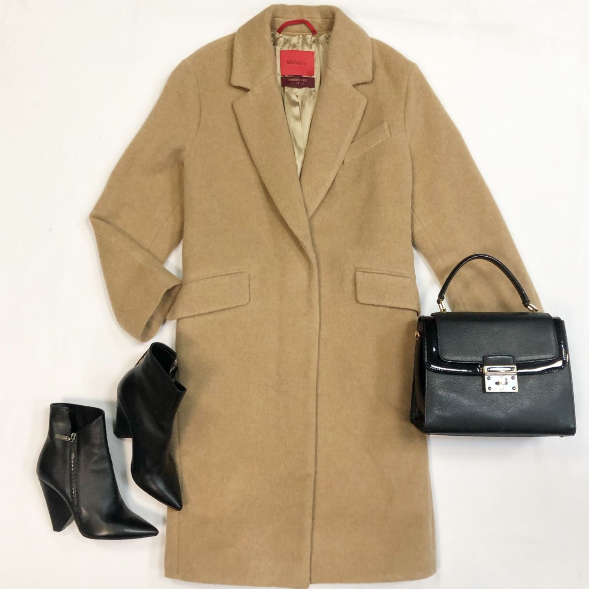 Пальто Maxco размер 44 цена 12 308 рубБотинки Saint Laurent размер 38.5 цена 18 462 рубСумка Dolce Gabbana
