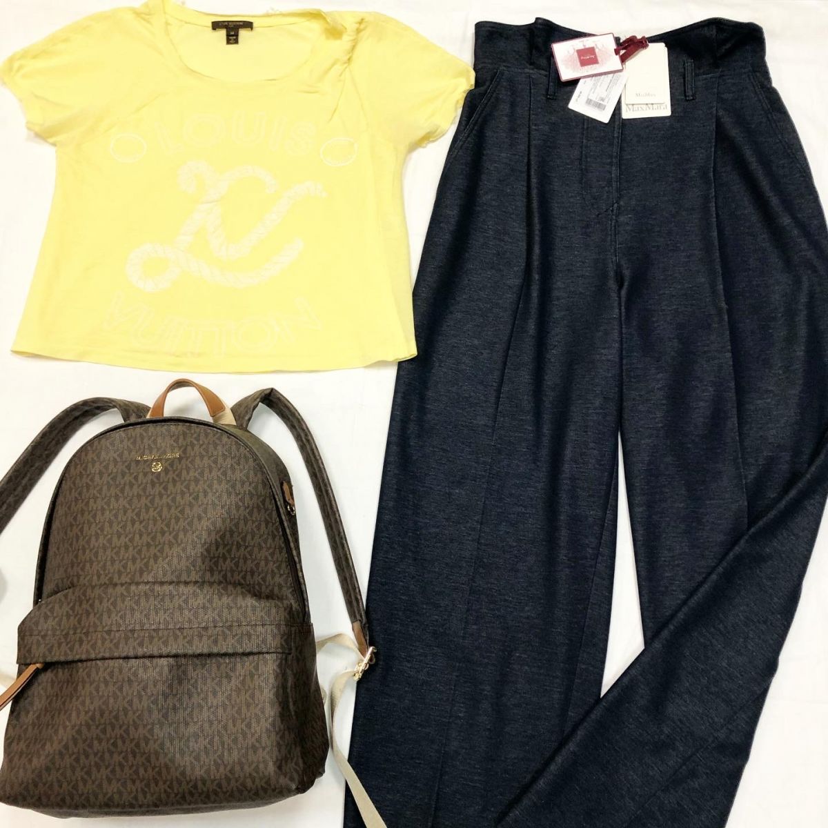 Брюки Max Mara размер 48 цена 23 078 руб /с ценником/ Футболка Louis Vuitton размер S цена 7 693 рубРюкзак Michael Kors